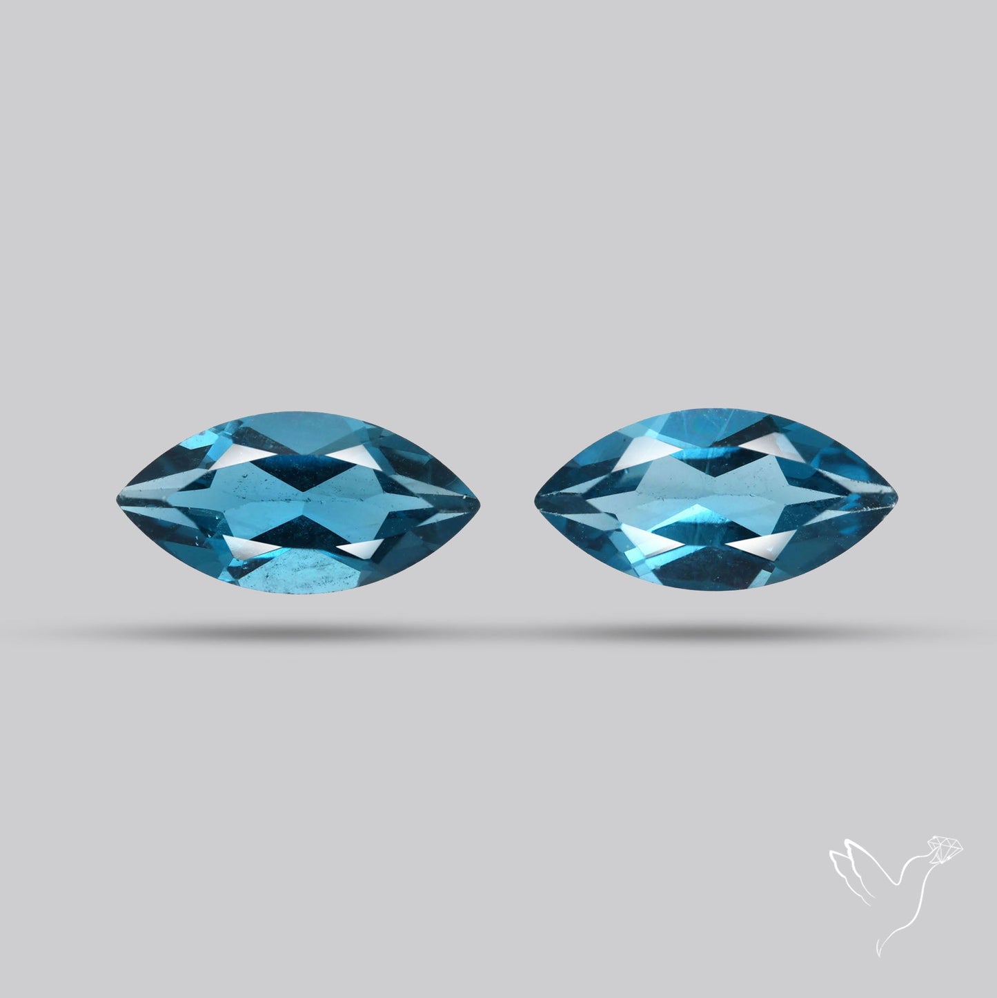 Faceted London Blue Topaz Pair