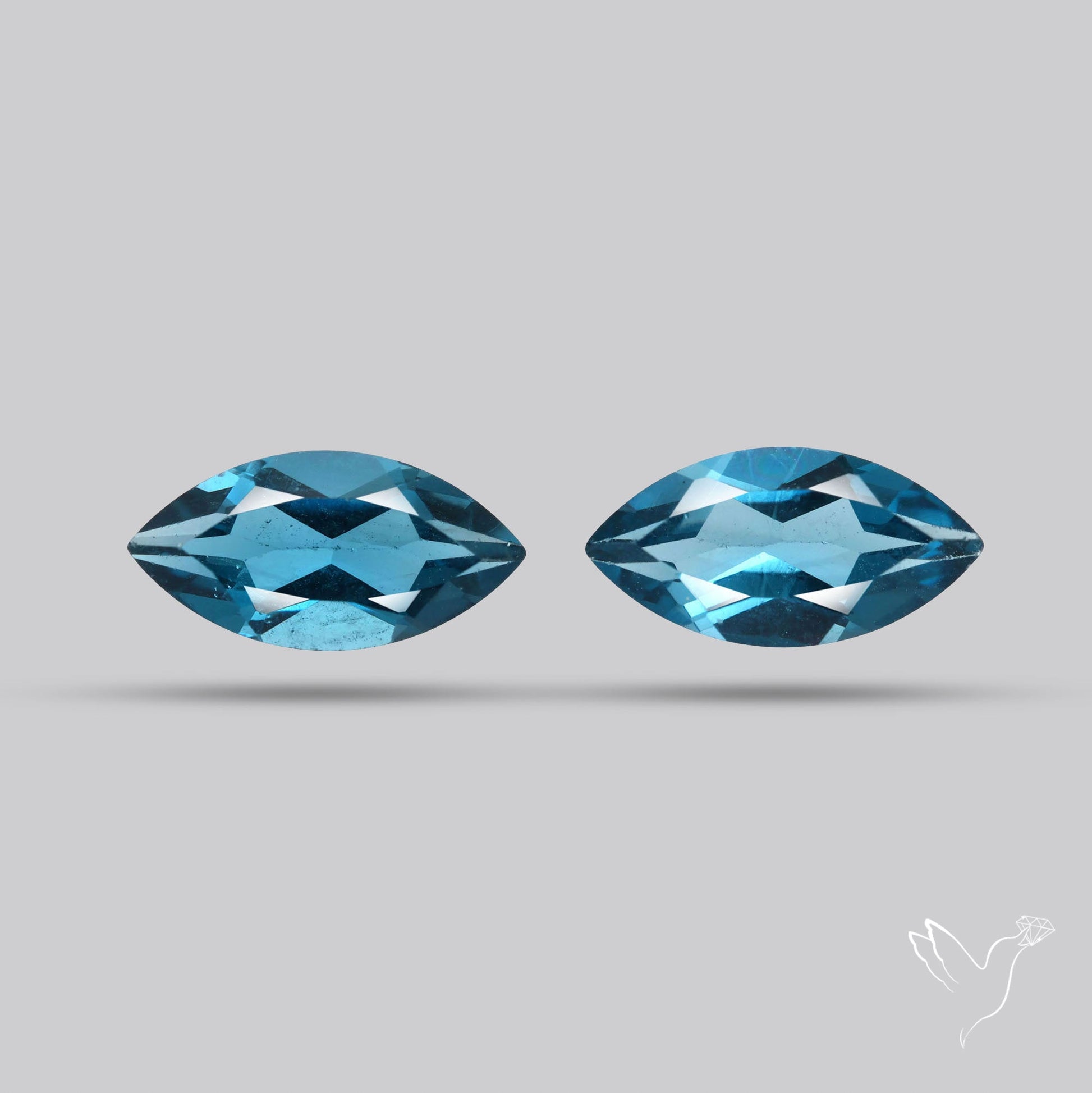 Faceted London Blue Topaz Pair