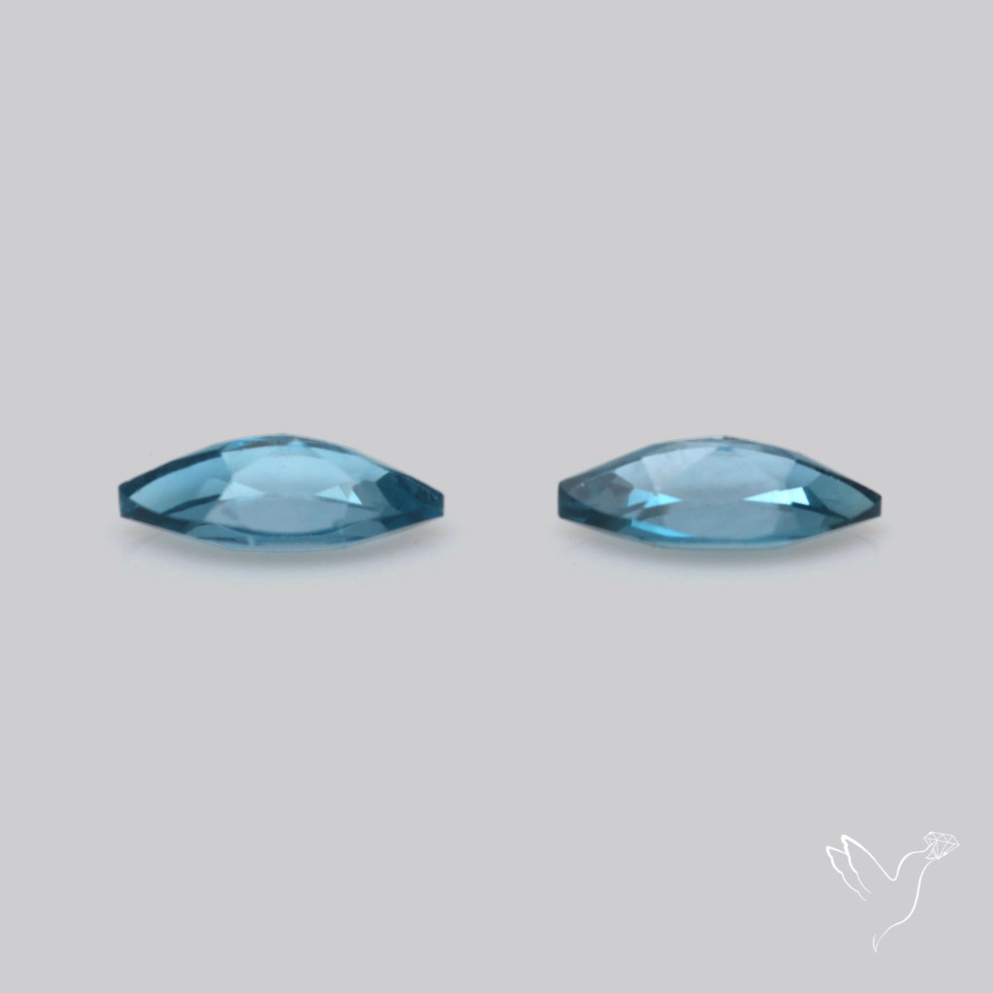 Faceted London Blue Topaz Pair