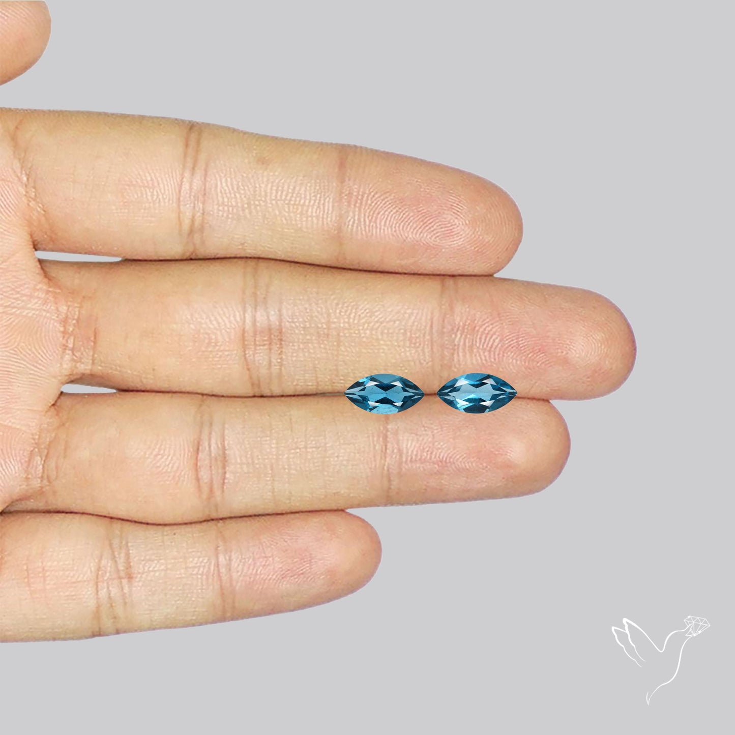 Faceted London Blue Topaz Pair