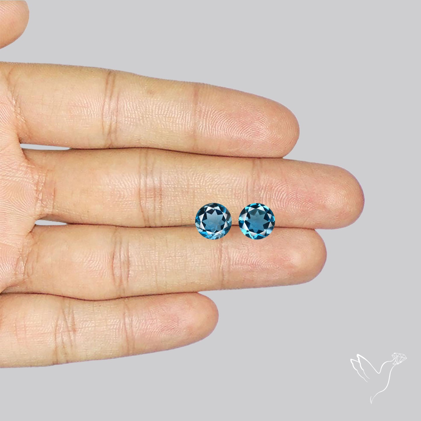 Faceted London Blue Topaz Pair