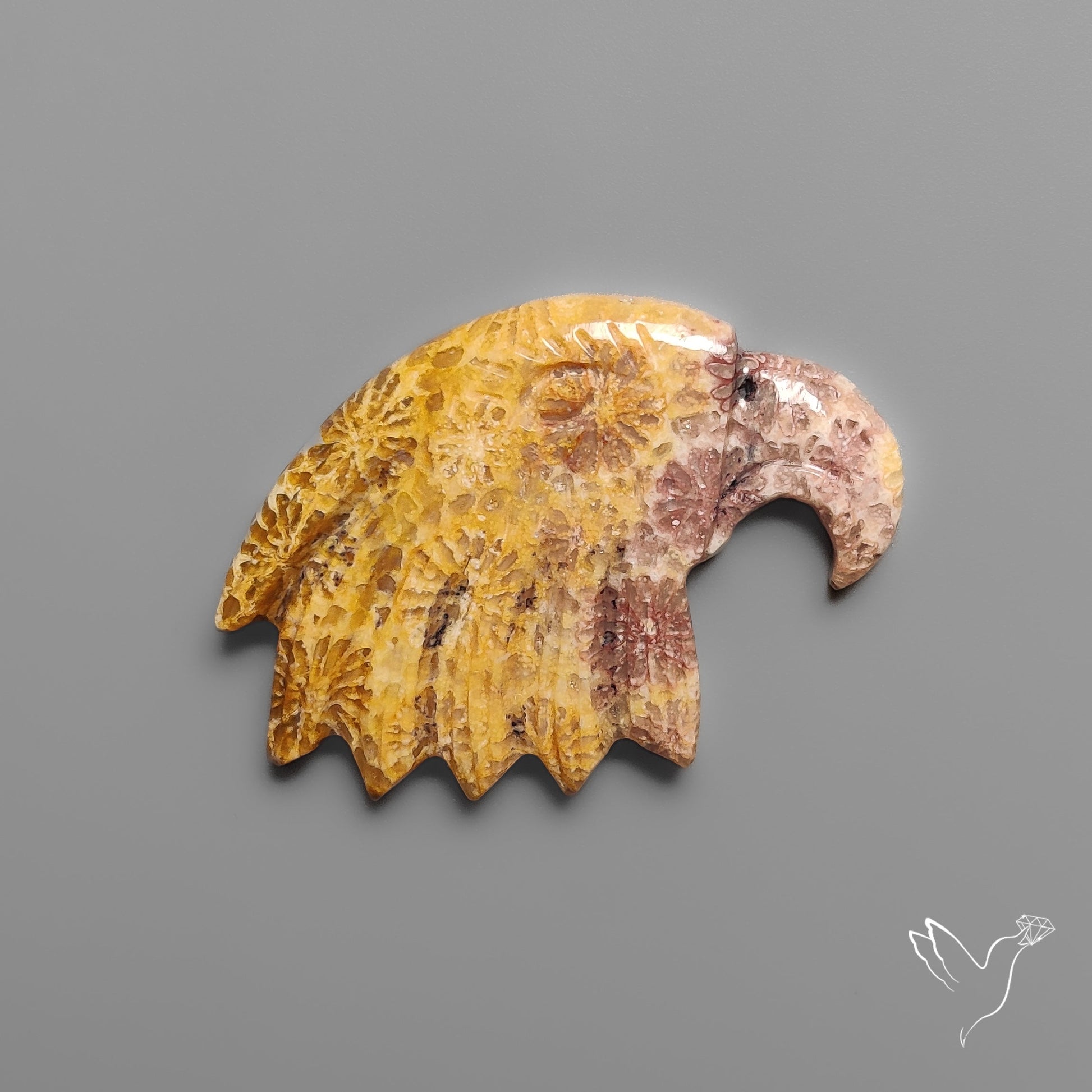 Fossil Coral Eagle Head Carving