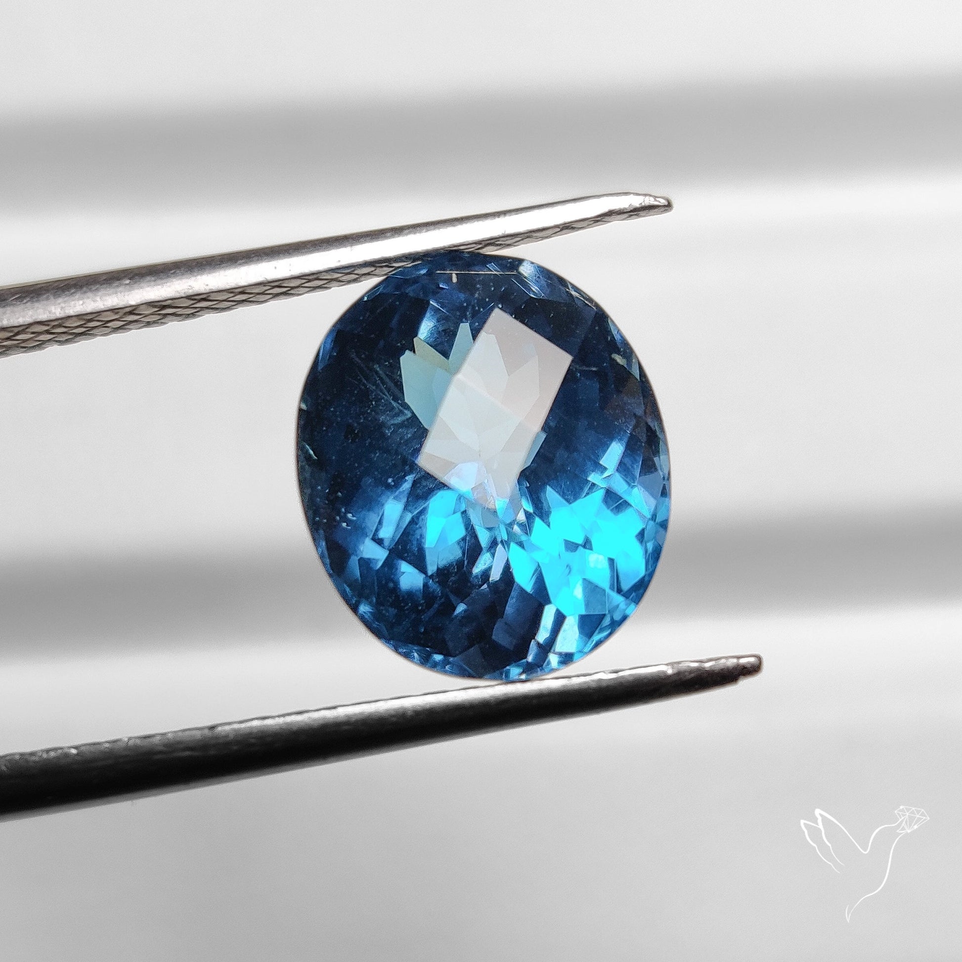 Faceted London Blue Topaz with Checker Facets