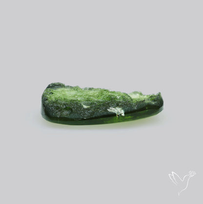 Moldavite Cabochon with Natural Raw Back