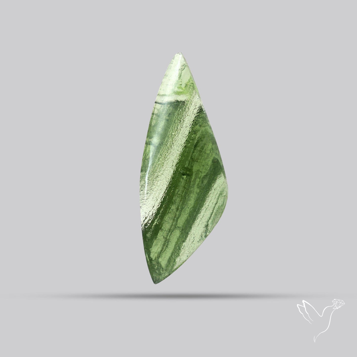 Moldavite Cabochon with Natural Raw Back