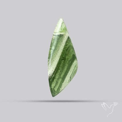 Moldavite Cabochon with Natural Raw Back