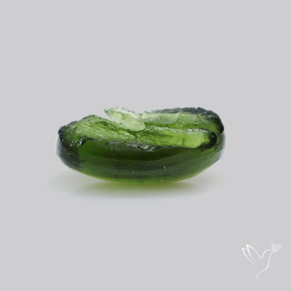 Moldavite Cabochon with Natural Raw Back