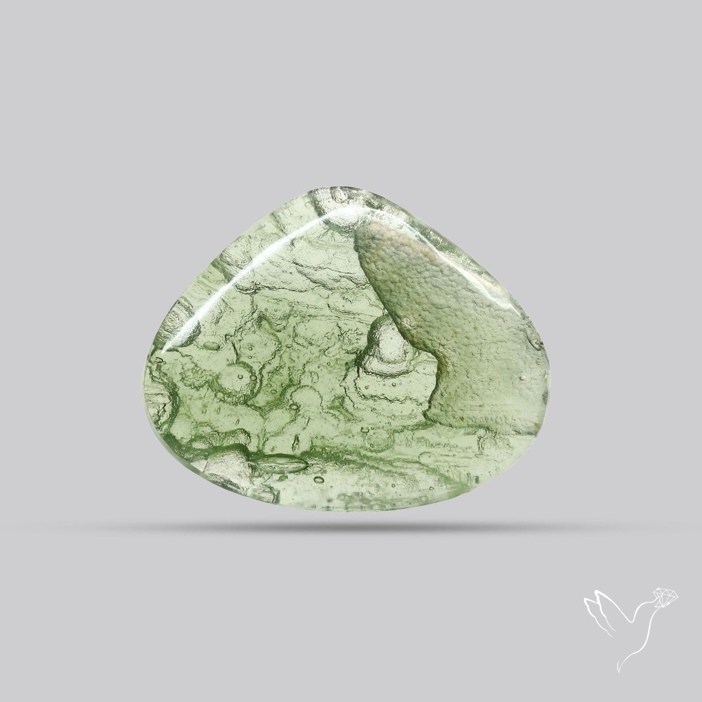 Moldavite Cabochon with Natural Raw Back