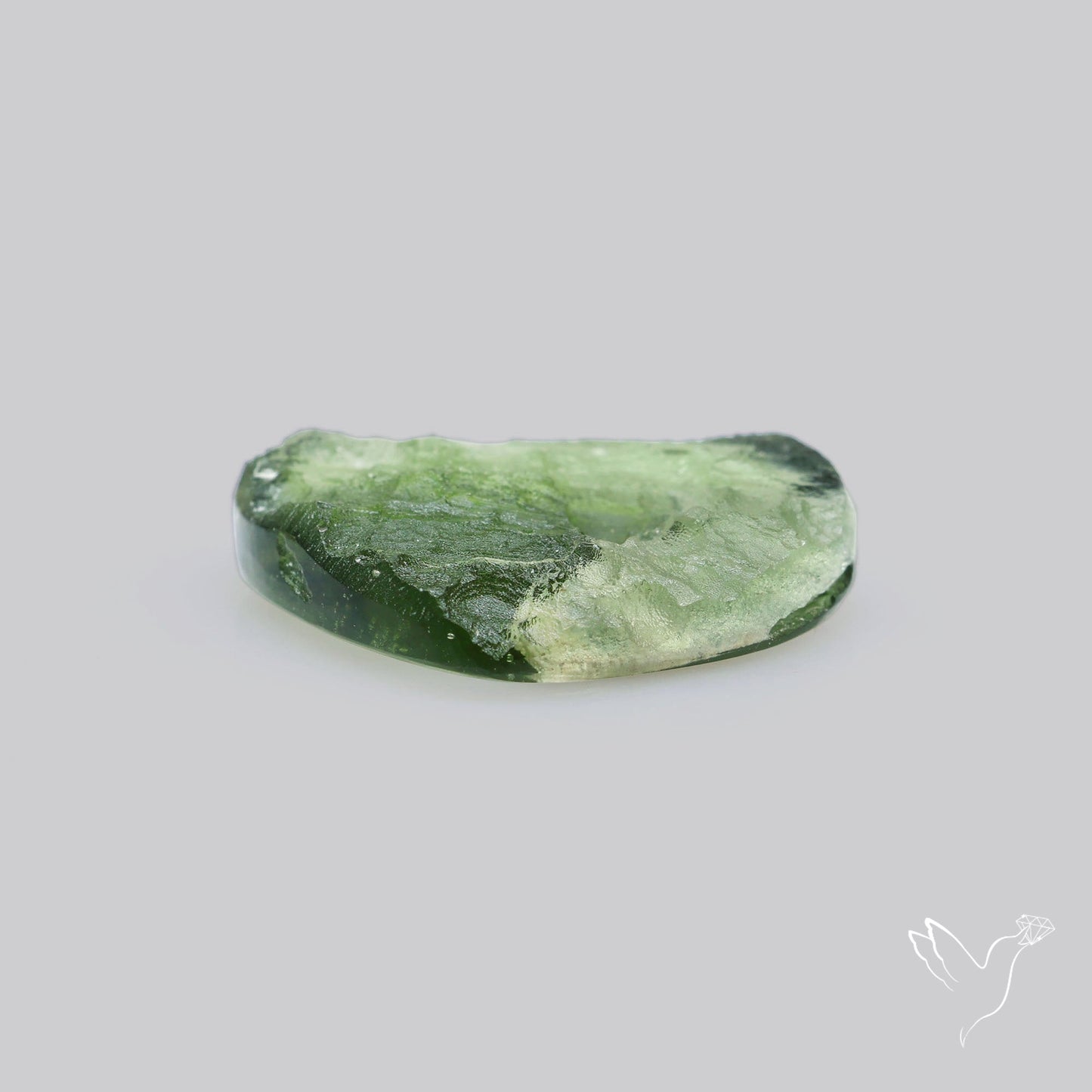 Moldavite Cabochon with Natural Raw Back