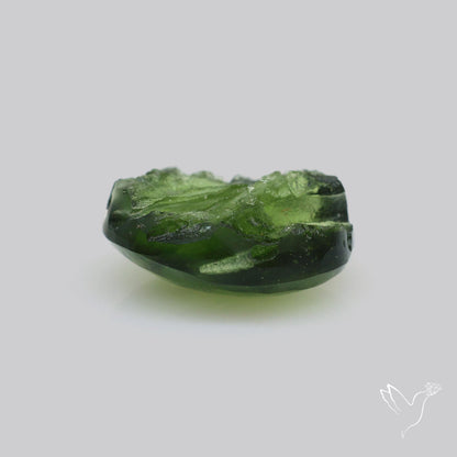 Moldavite Cabochon with Natural Raw Back