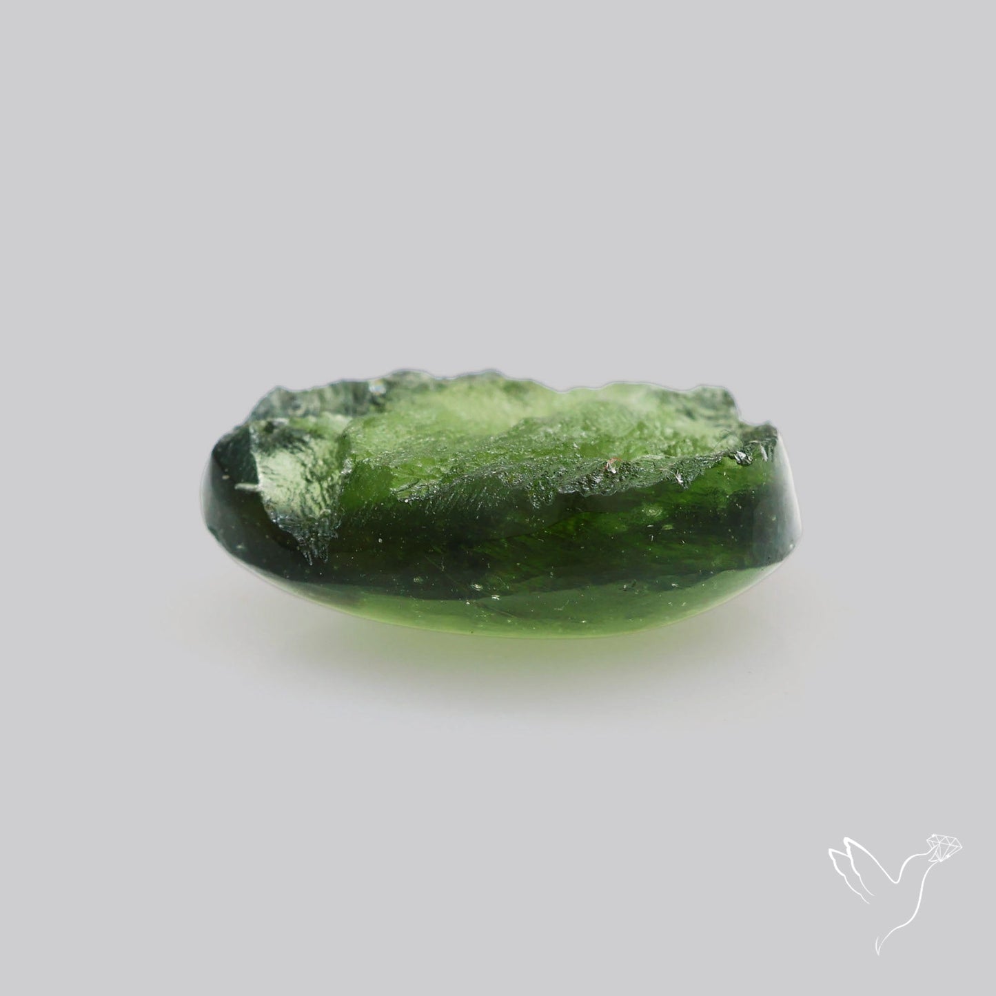Moldavite Cabochon with Natural Raw Back