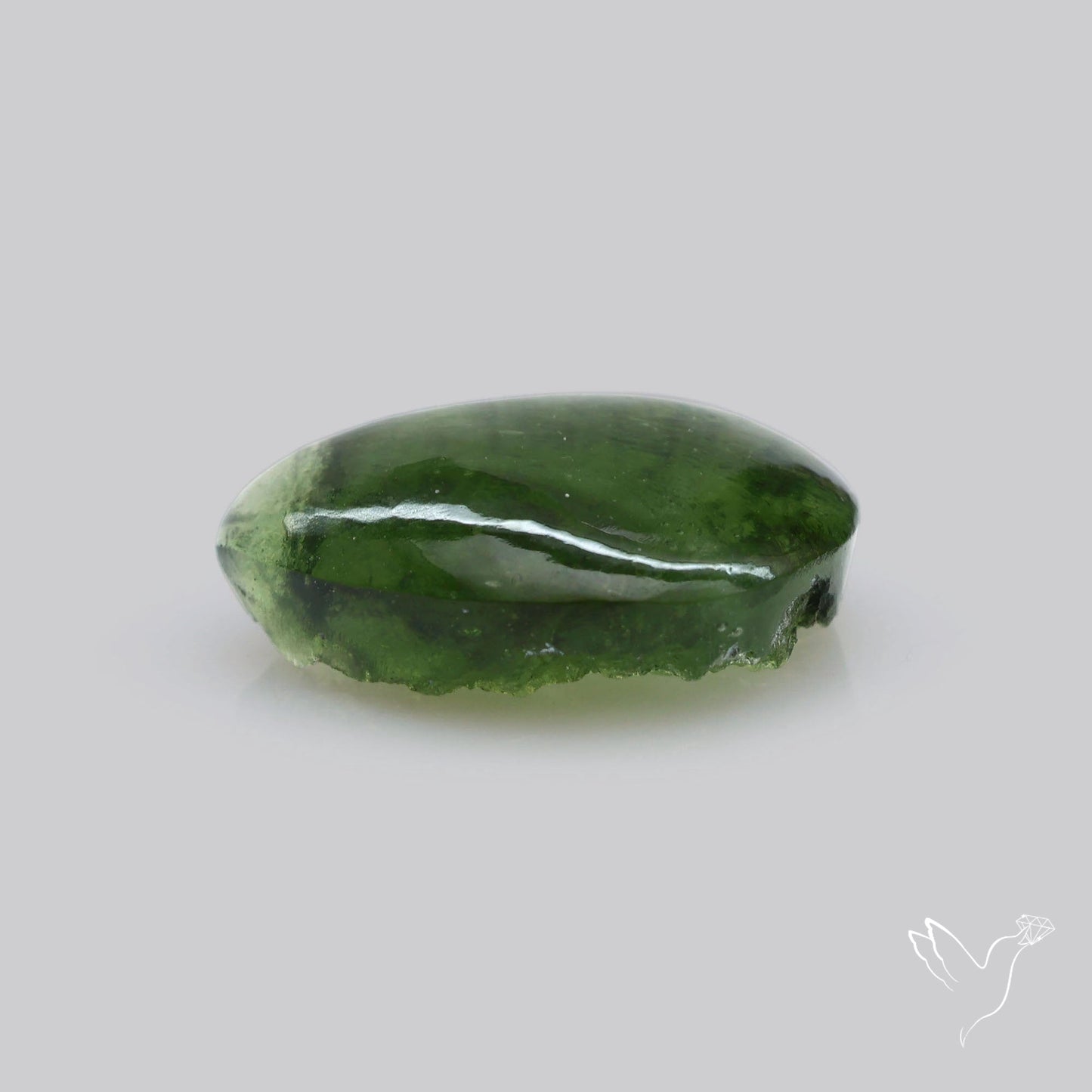 Moldavite Cabochon with Natural Raw Back