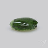 Moldavite Cabochon with Natural Raw Back