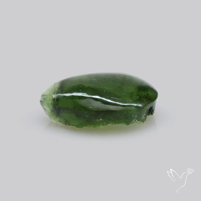 Moldavite Cabochon with Natural Raw Back