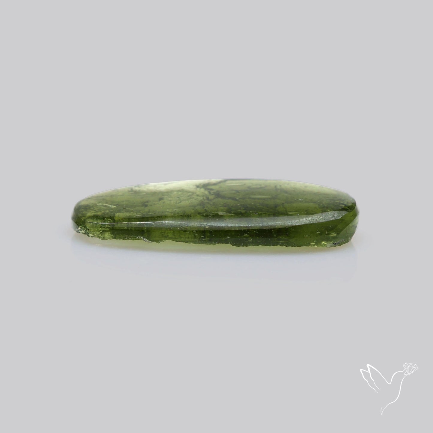 Moldavite Cabochon with Natural Raw Back
