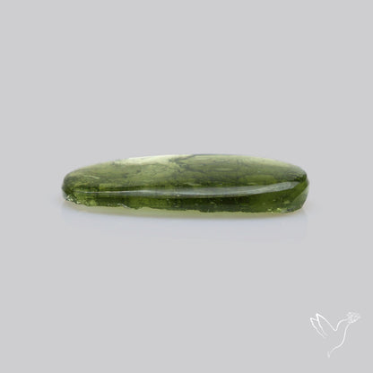Moldavite Cabochon with Natural Raw Back
