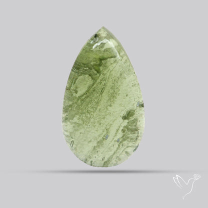 Moldavite Cabochon with Natural Raw Back
