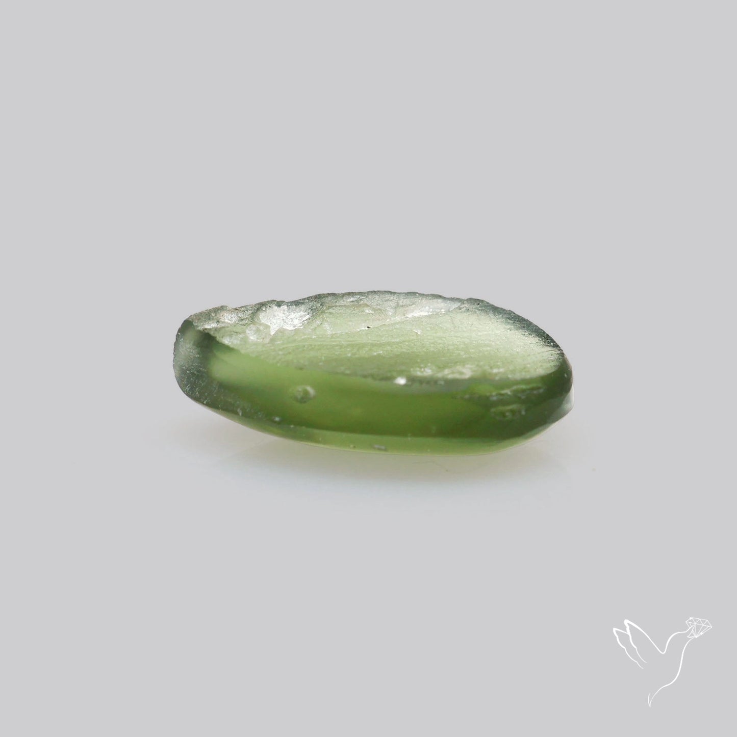 Moldavite Cabochon with Natural Raw Back