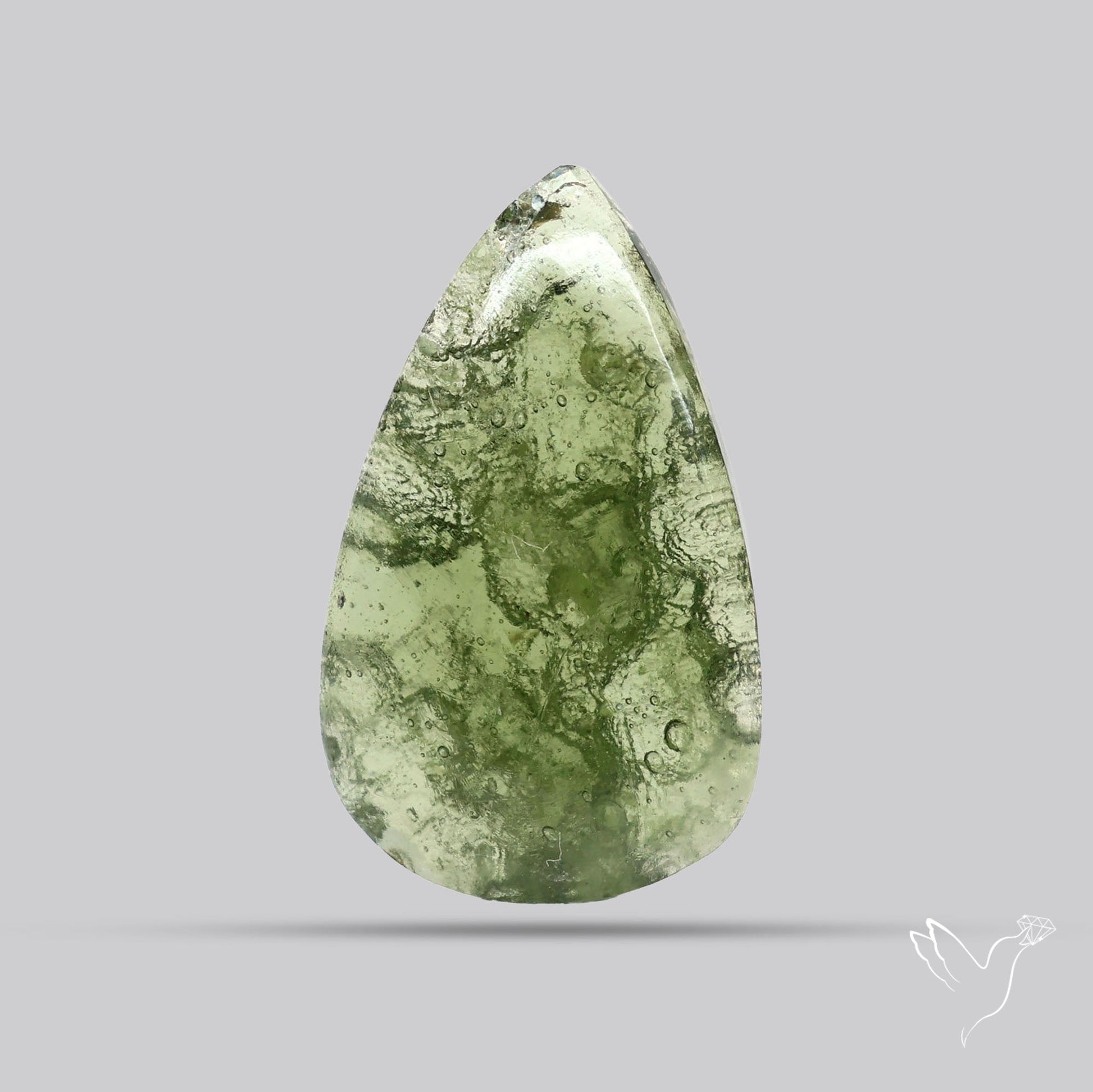 Moldavite Cabochon with Natural Raw Back
