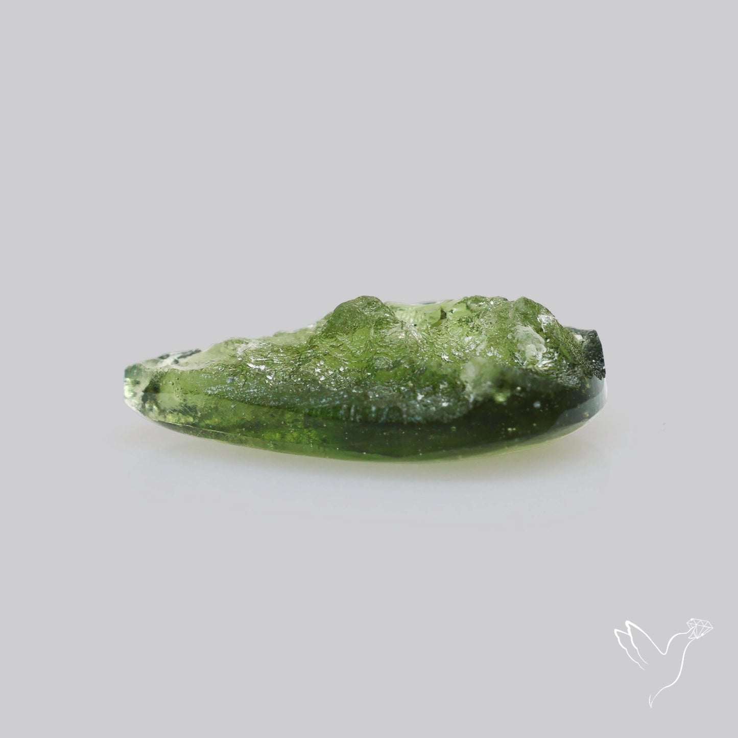 Moldavite Cabochon with Natural Raw Back