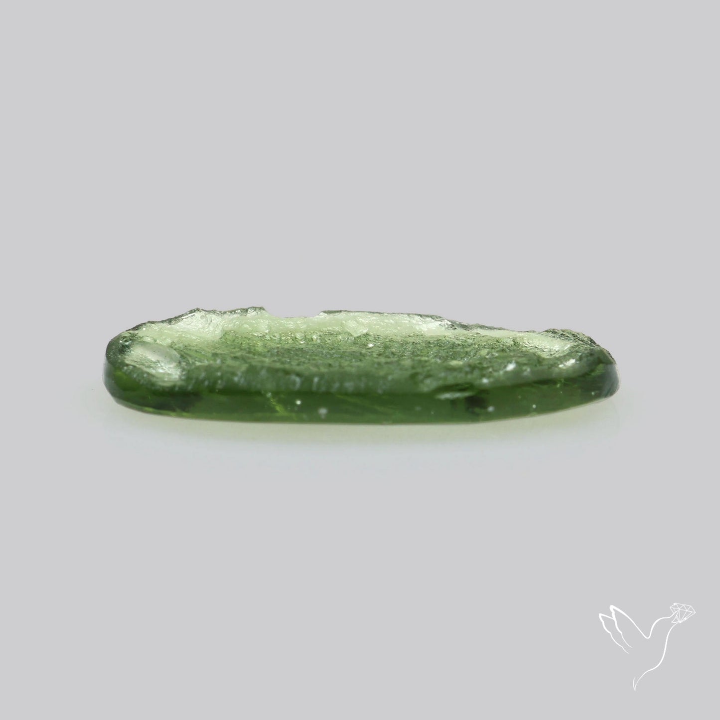 Moldavite Cabochon with Natural Raw Back