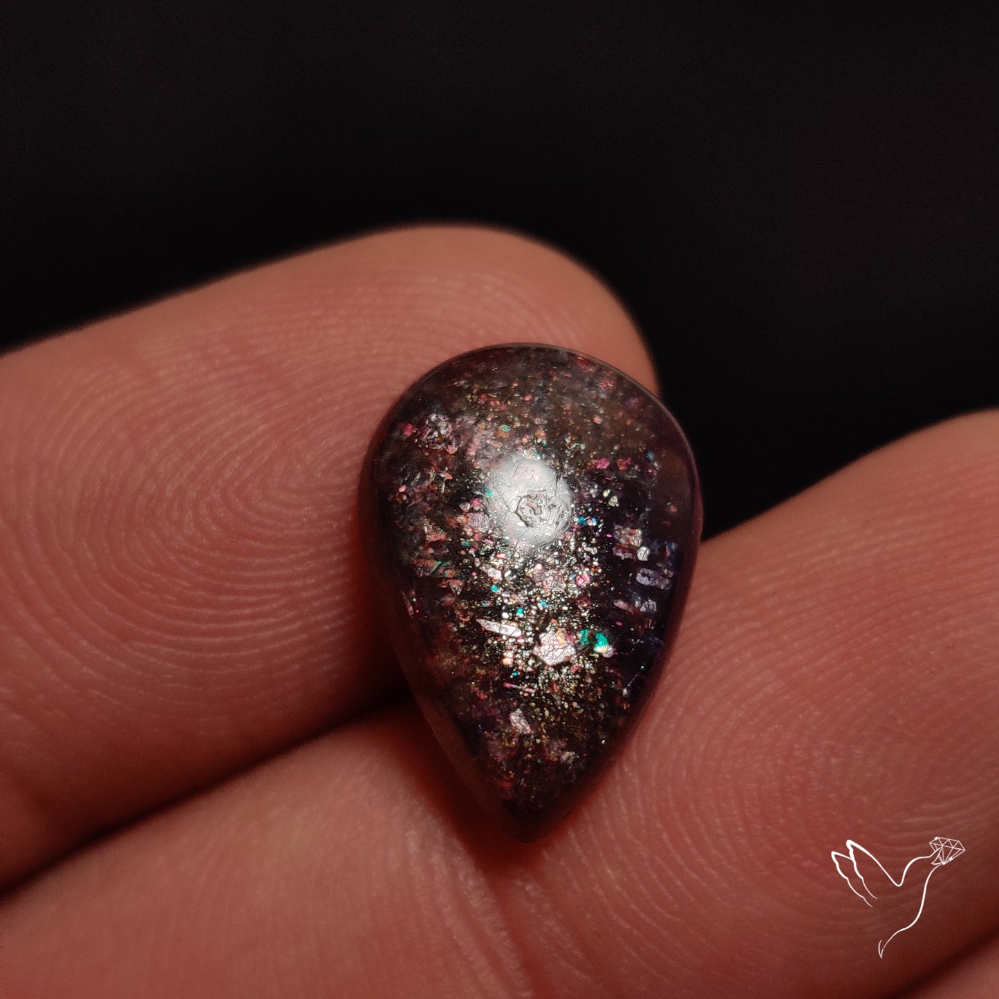 Buy Bloodshot Iolite In Sunstone Cabochon N46371 Online at GemstonesForSale