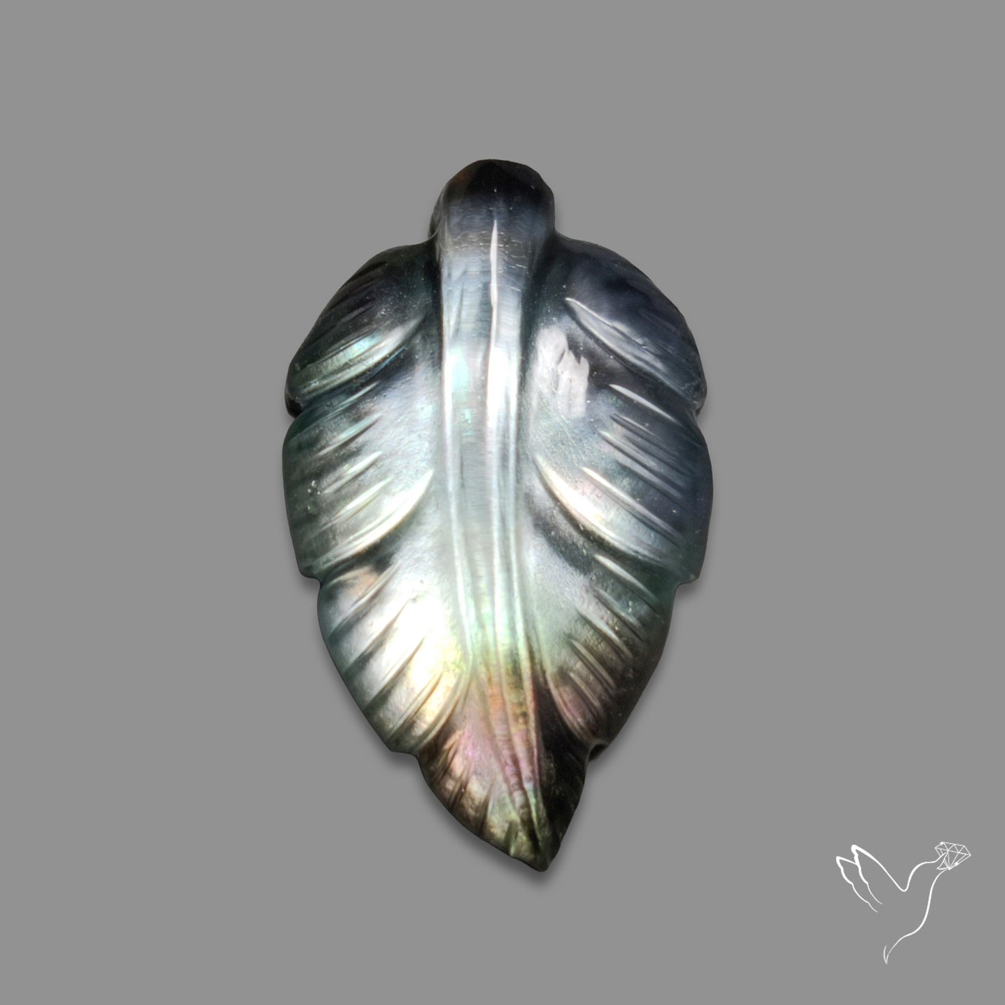 Himalayan Quartz With Black Mother Of Pearl Doublet Leaf Carving