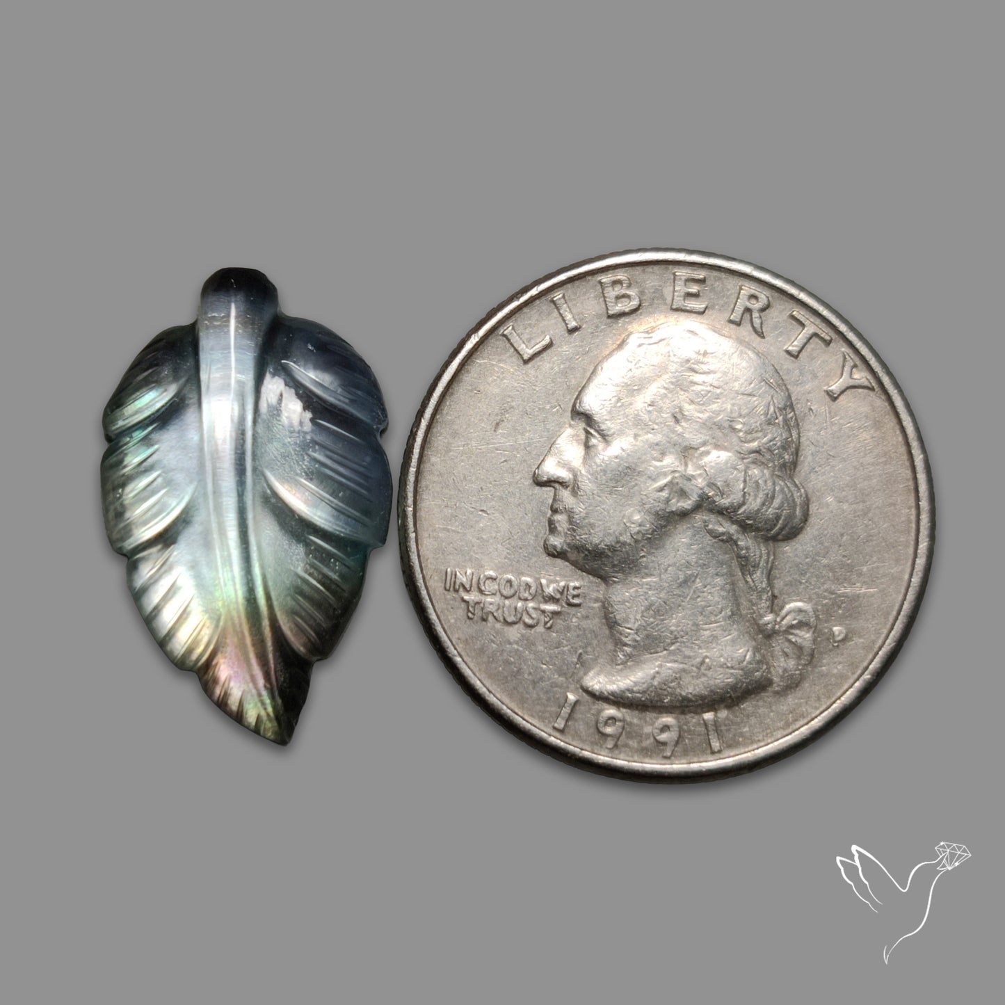 Himalayan Quartz With Black Mother Of Pearl Doublet Leaf Carving