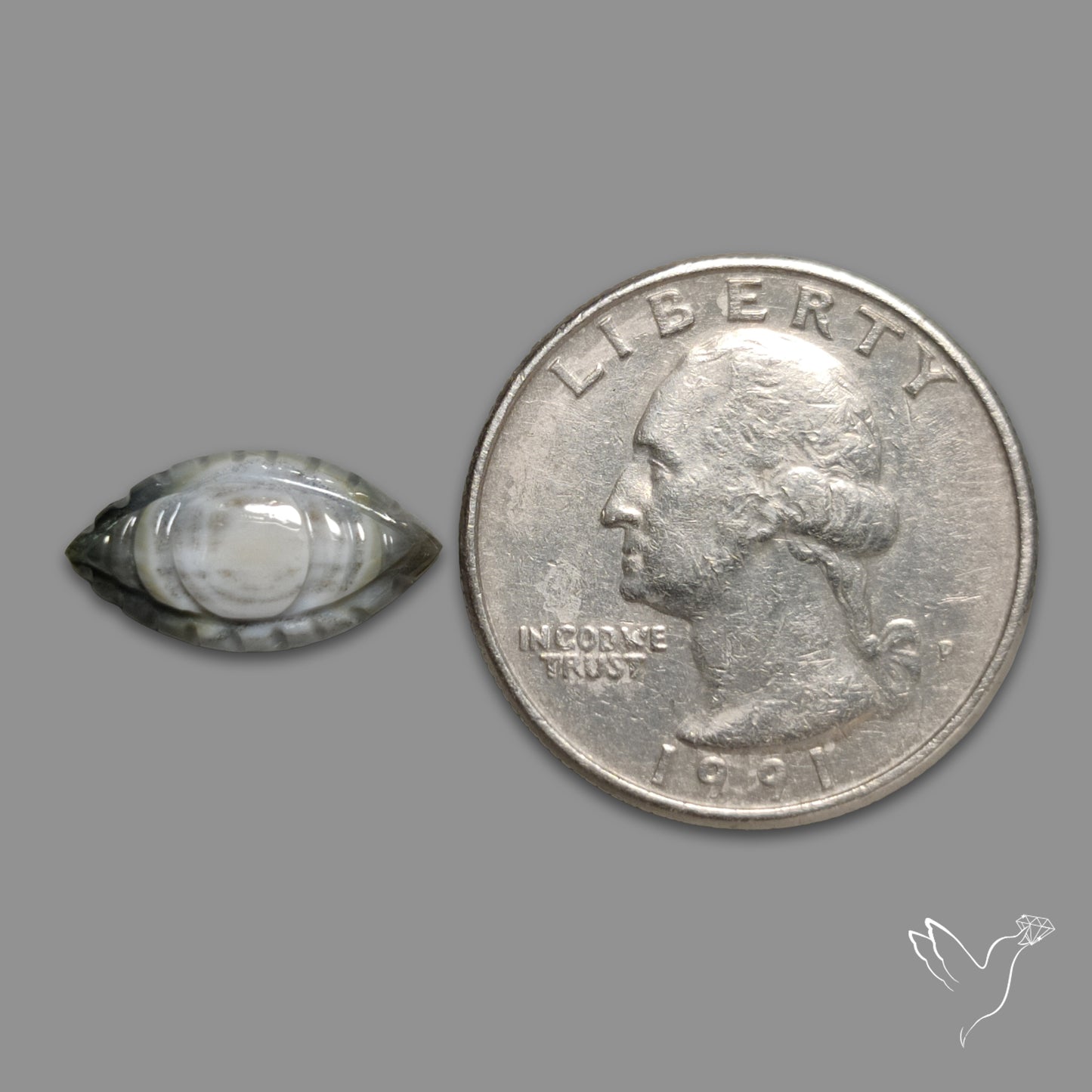 Owyhee Blue Opal Evil Eye Carving