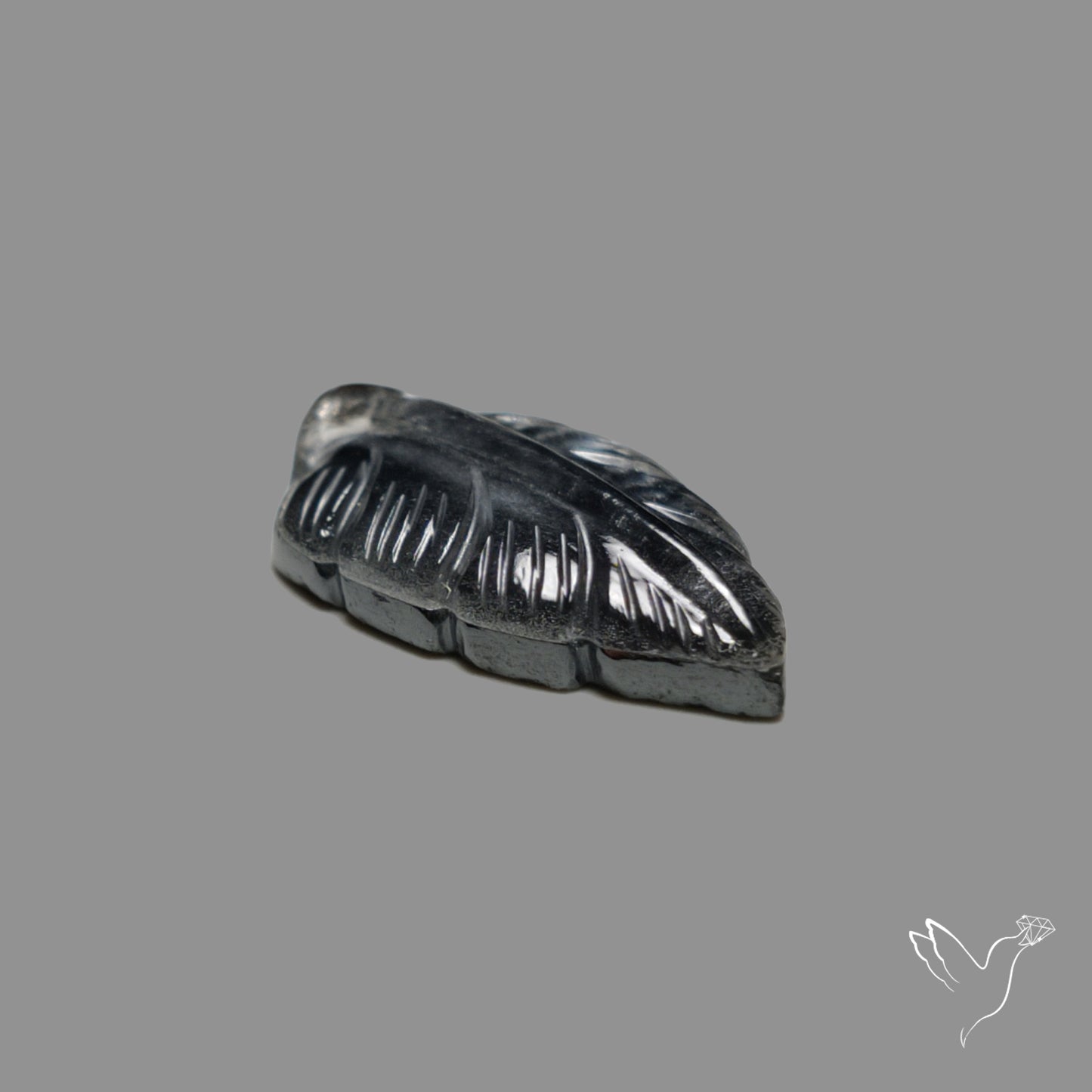 Himalayan Quartz With Hematite Leaf Carving Doublet