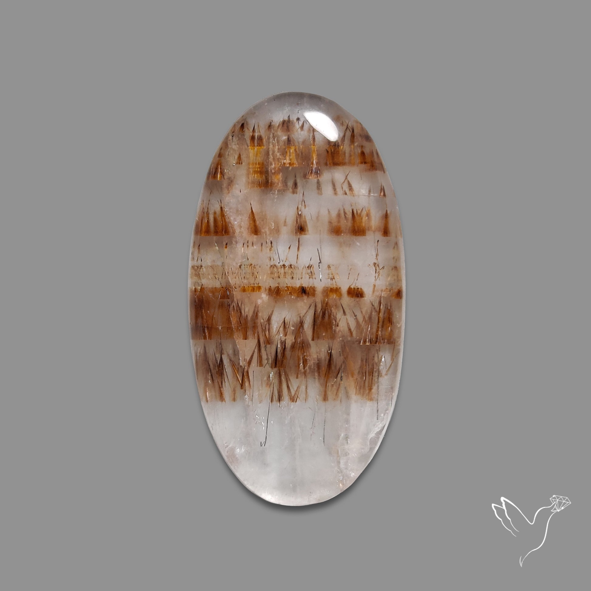 Cacoxenite In Quartz Cabochon
