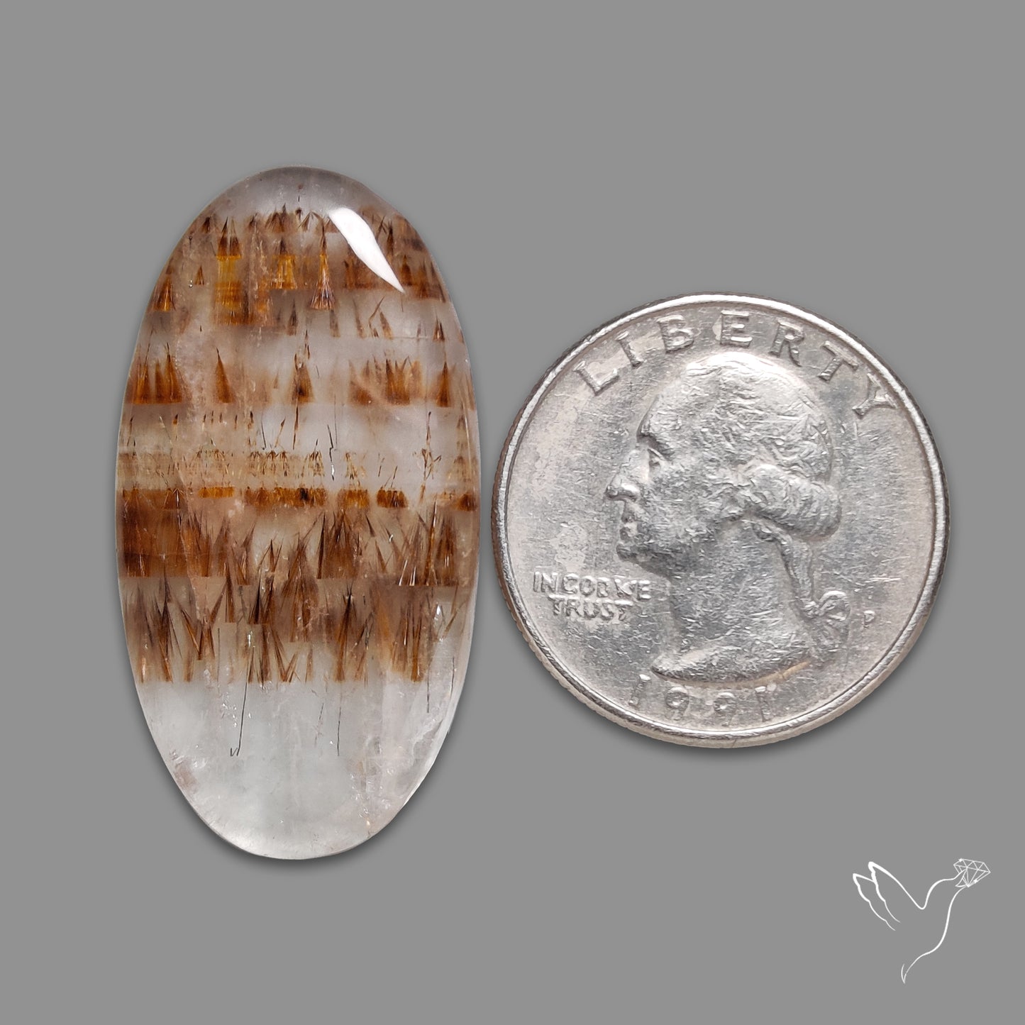 Cacoxenite In Quartz Cabochon