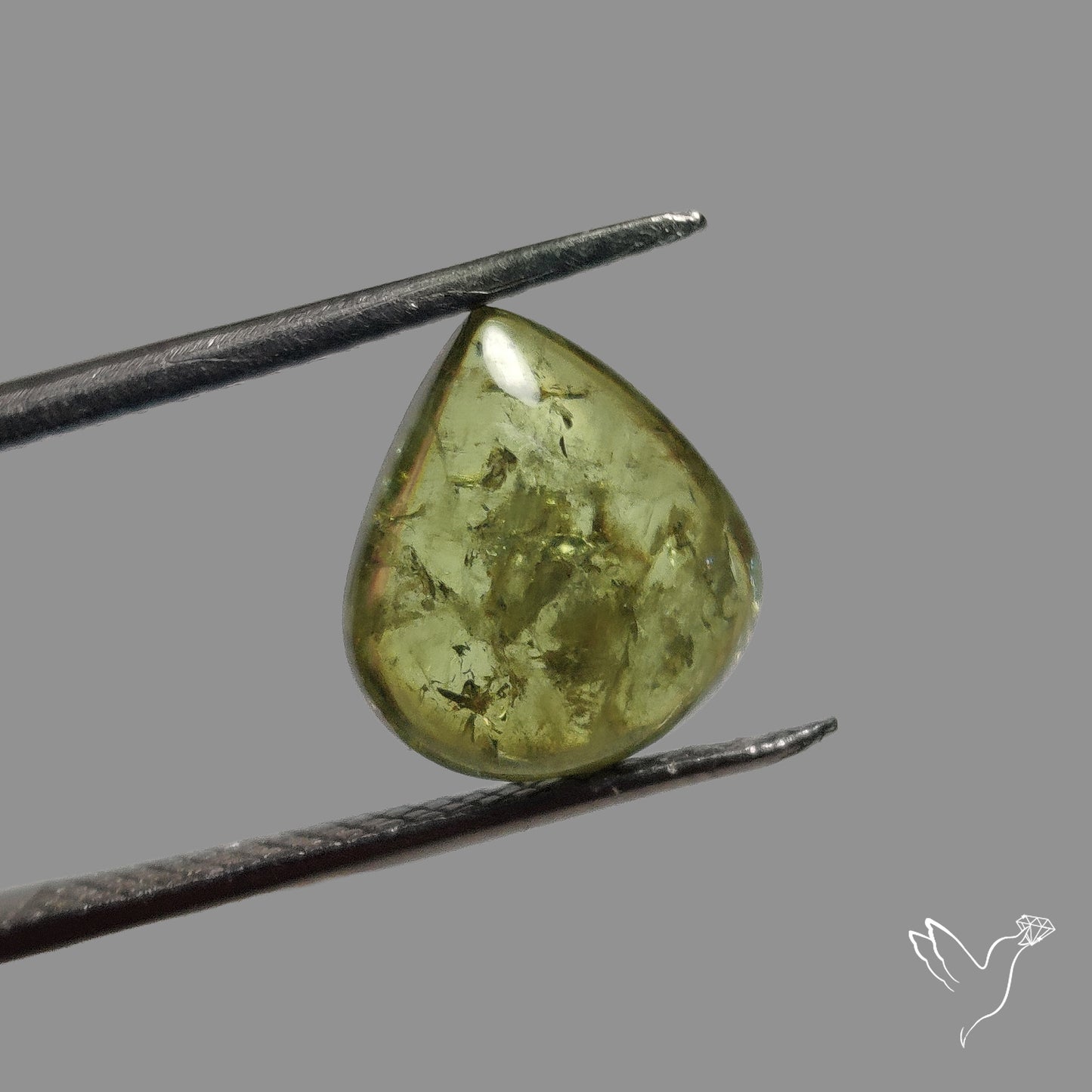 Rare Ural Demantoid Garnet Cabochon