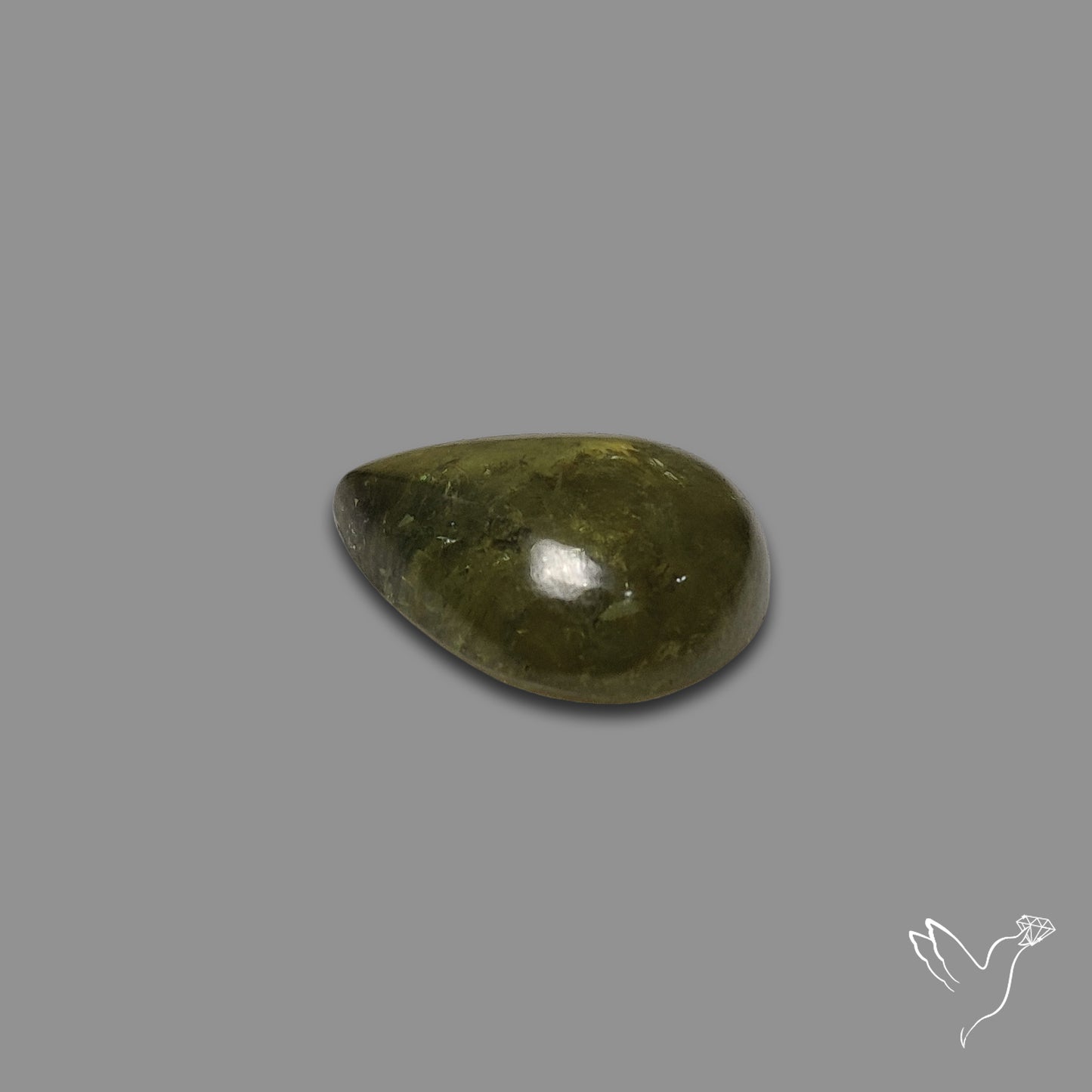Rare Ural Demantoid Garnet Cabochon