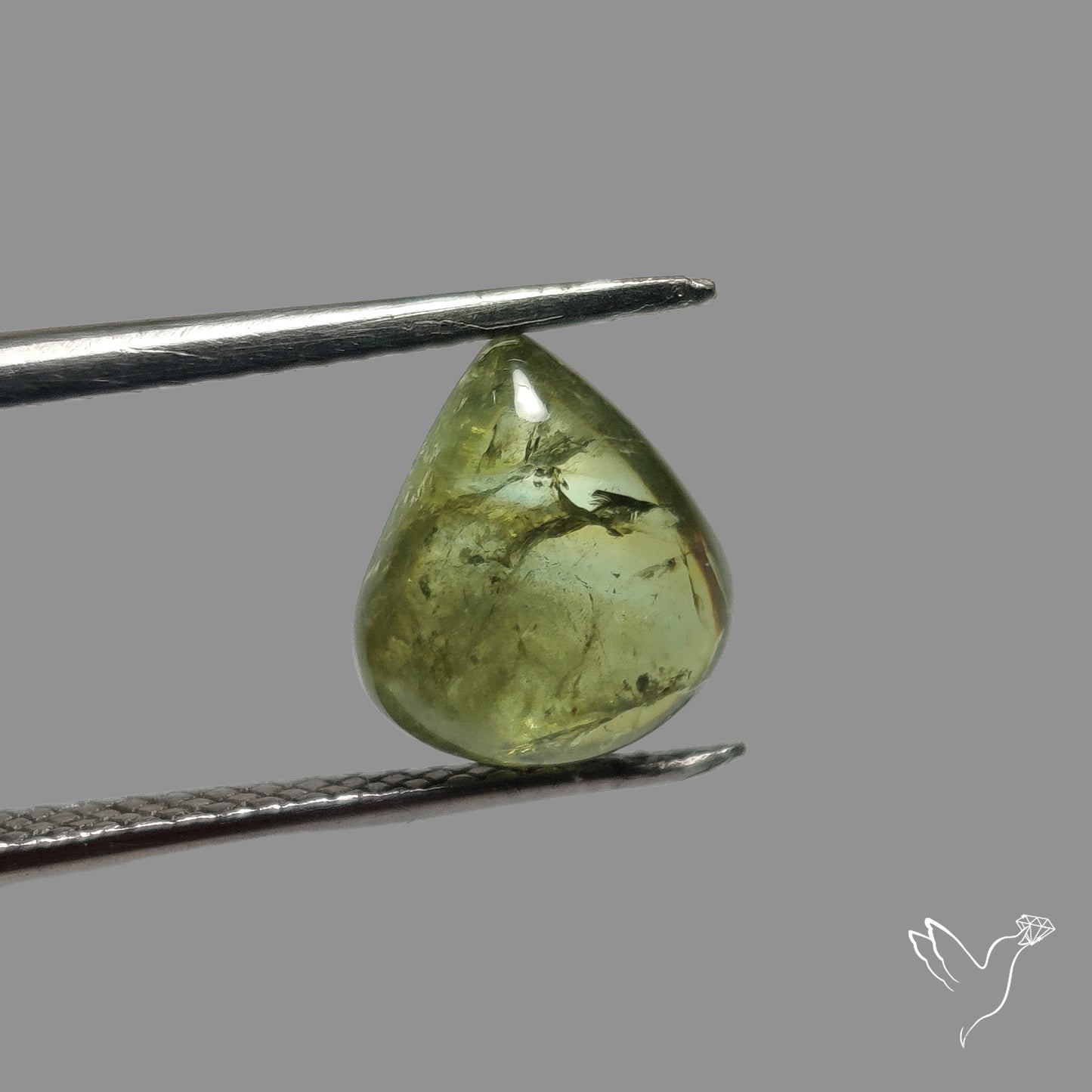 Rare Ural Demantoid Garnet Cabochon
