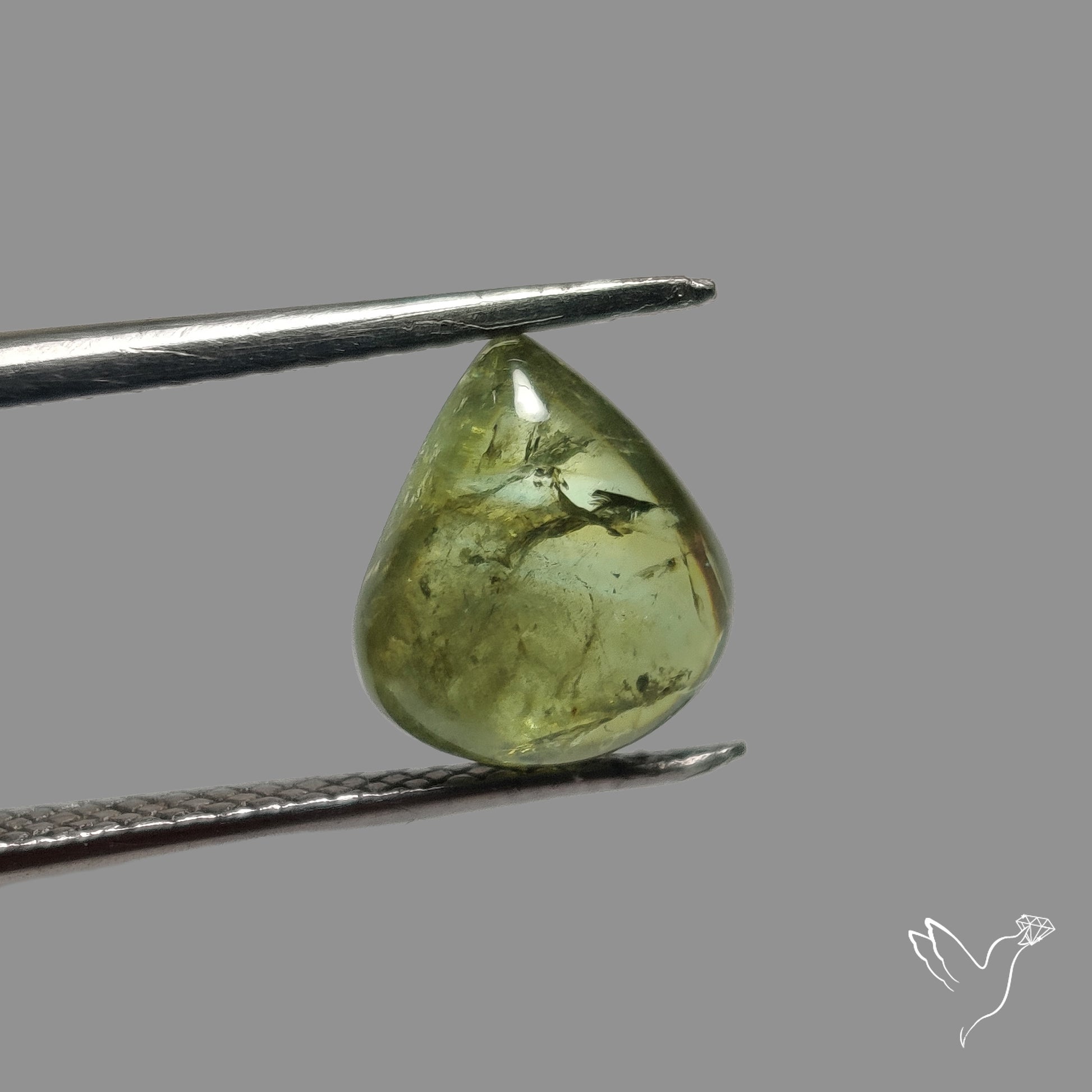 Rare Ural Demantoid Garnet Cabochon