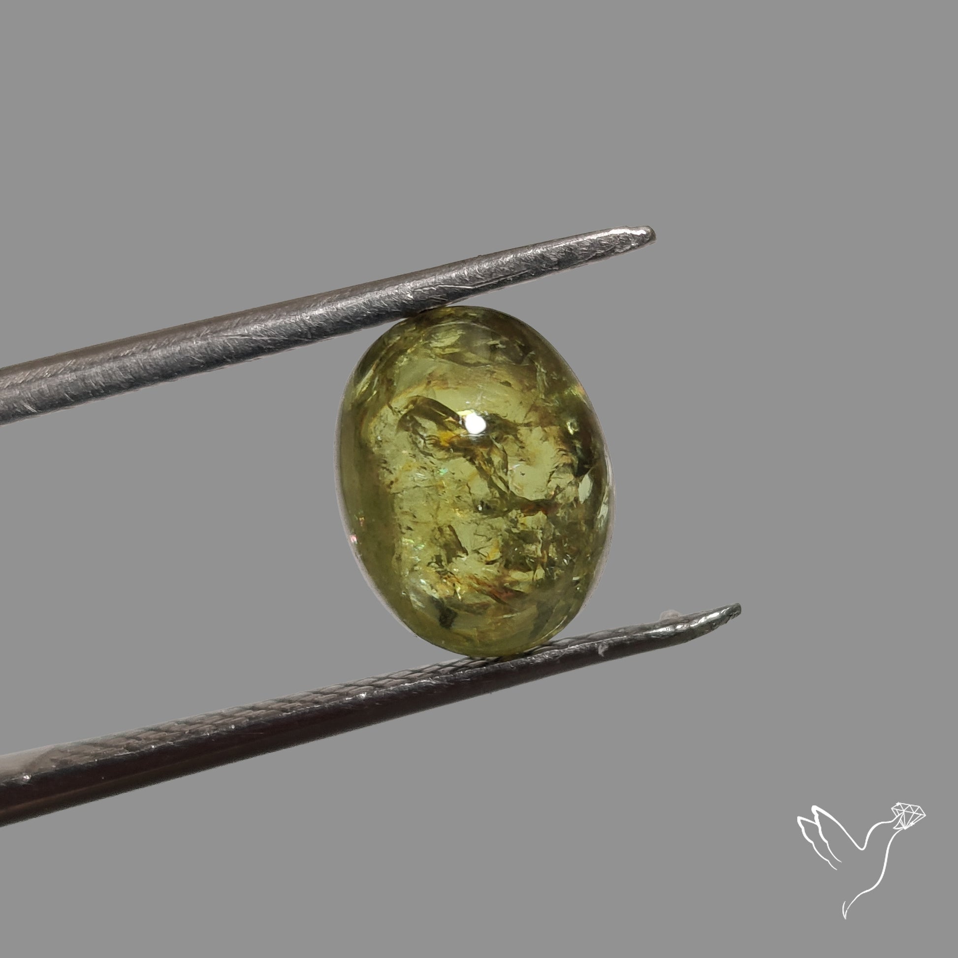 Rare Ural Demantoid Garnet Cabochon
