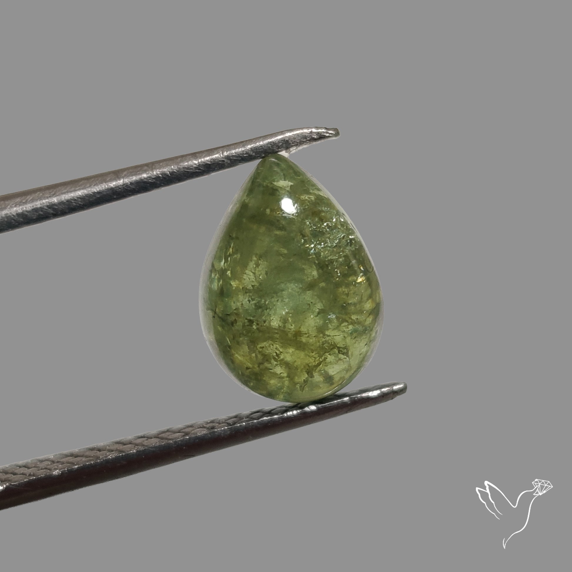 Rare Ural Demantoid Garnet Cabochon