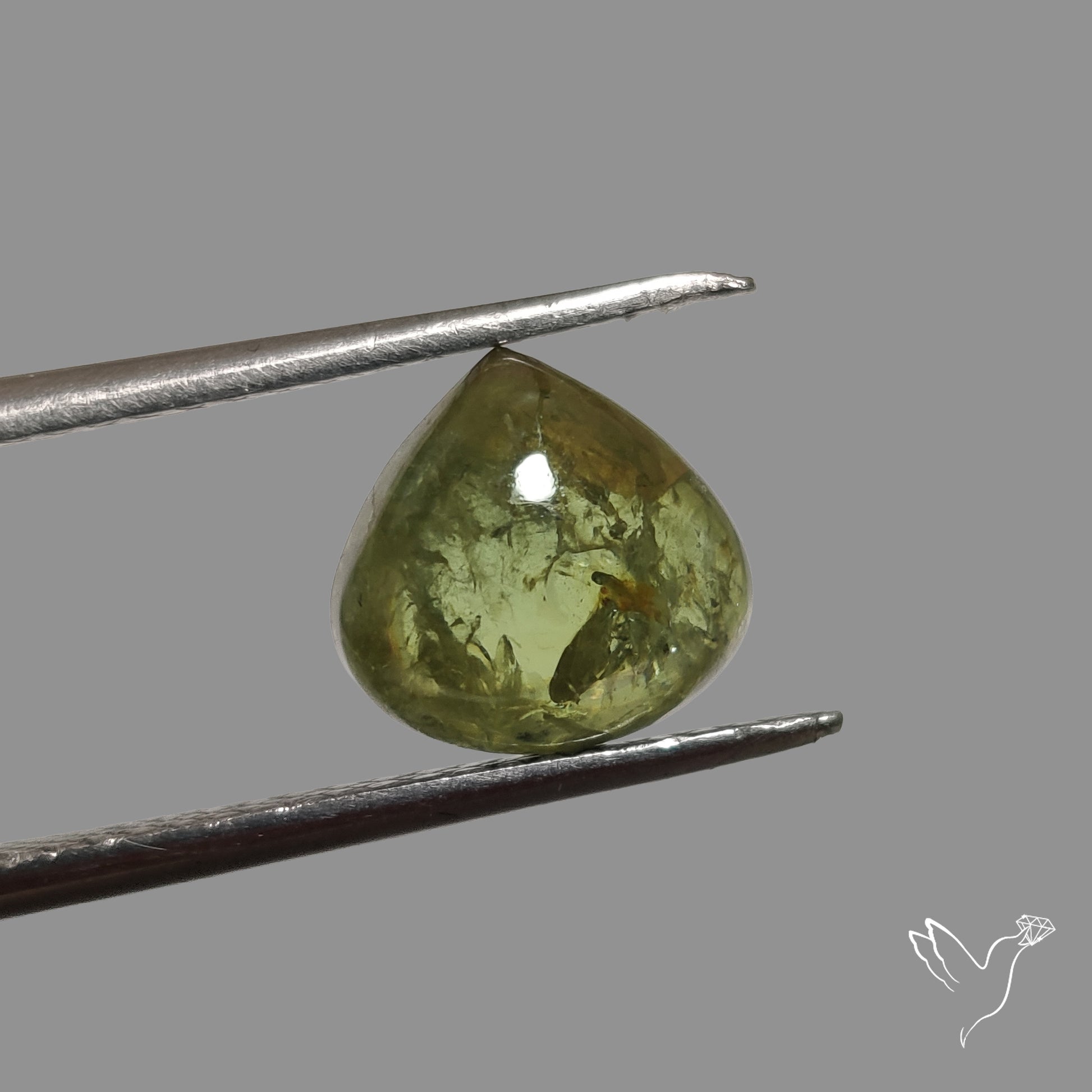 Rare Ural Demantoid Garnet Cabochon