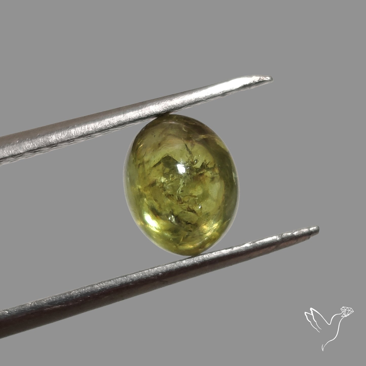 Rare Ural Demantoid Garnet Cabochon