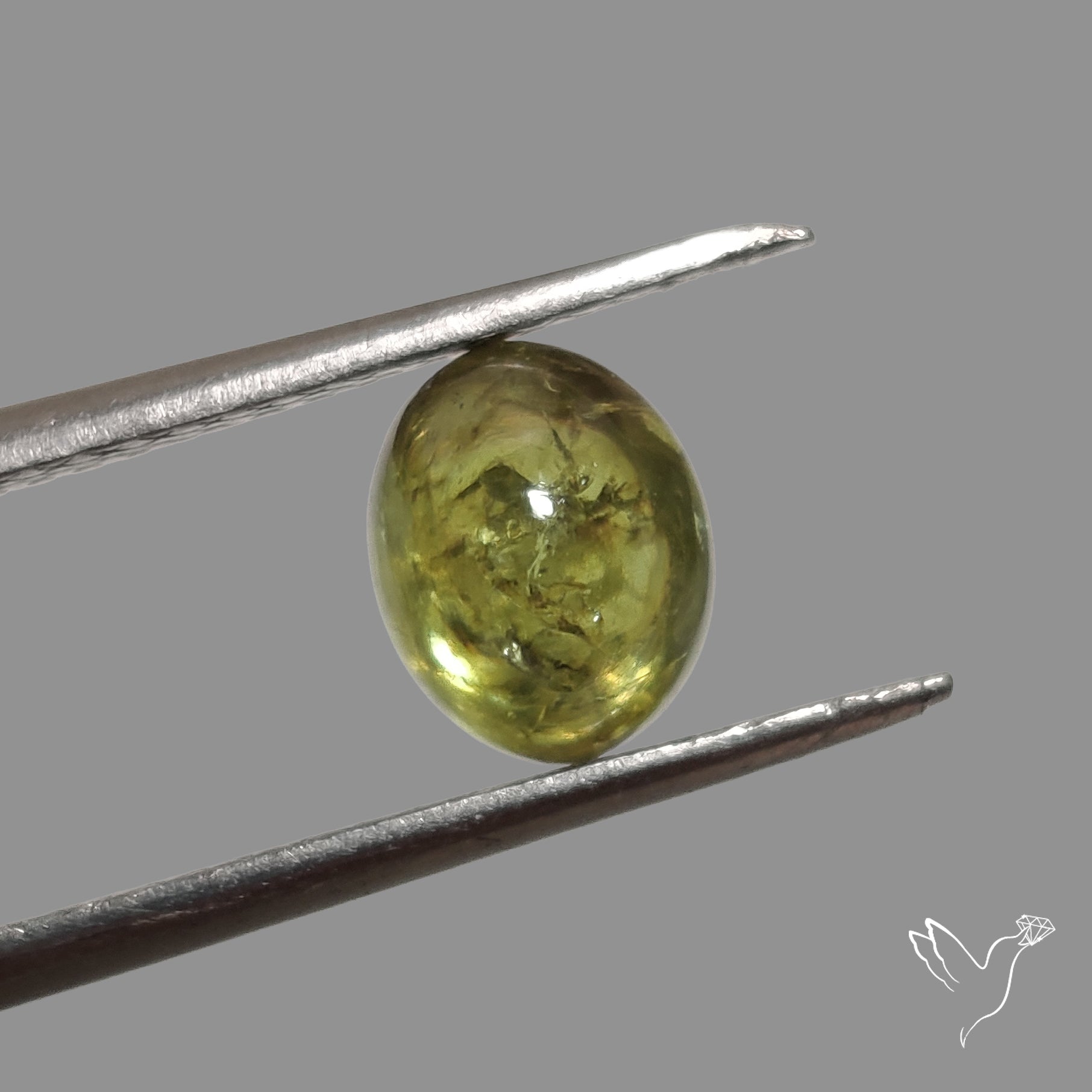 Rare Ural Demantoid Garnet Cabochon