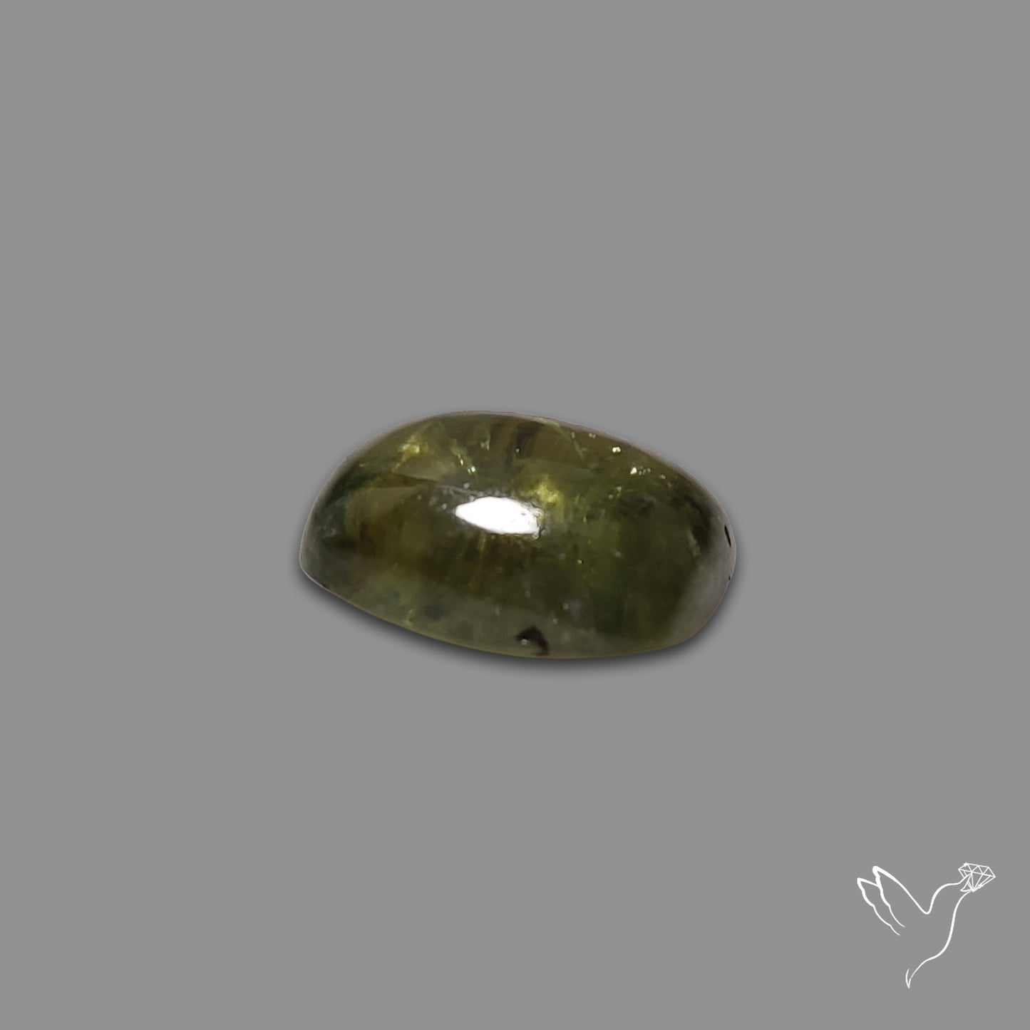 Rare Ural Demantoid Garnet Cabochon