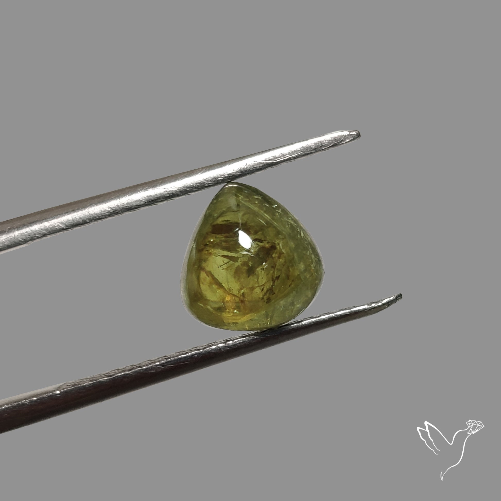 Rare Ural Demantoid Garnet Cabochon