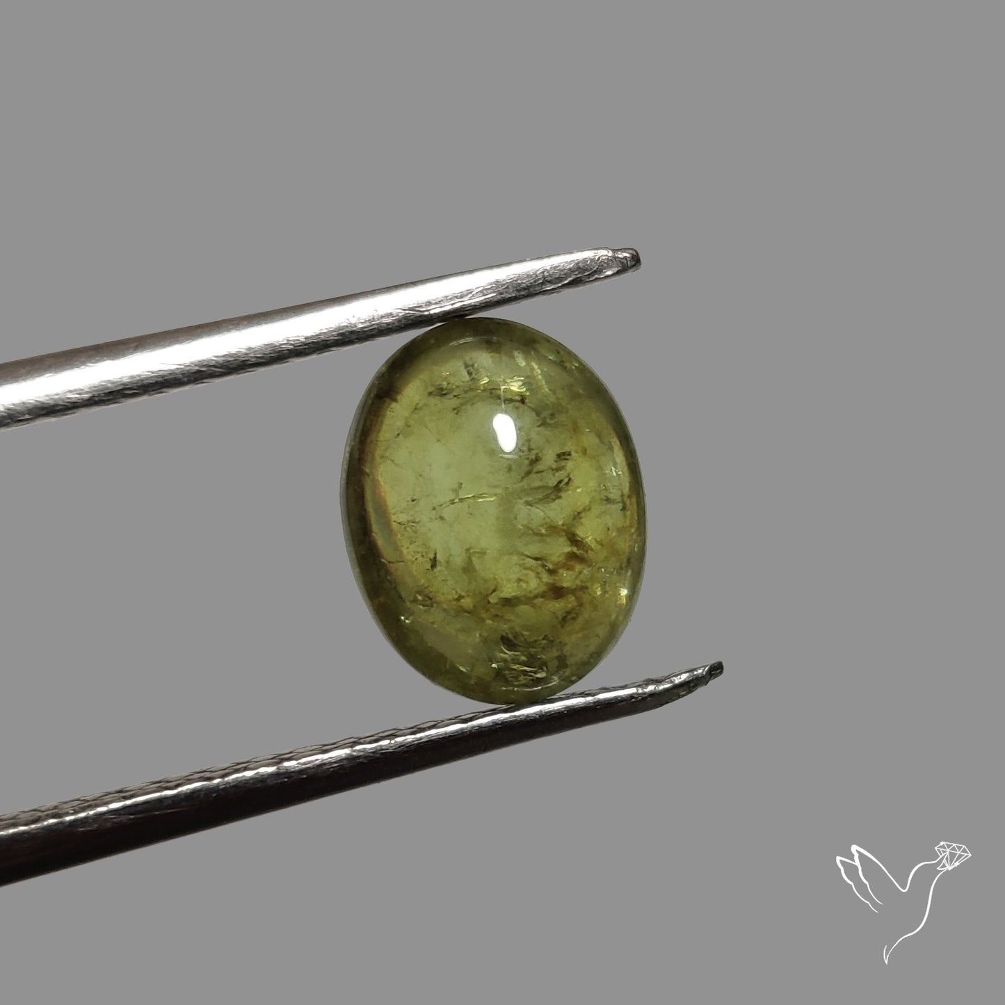 Rare Ural Demantoid Garnet Cabochon