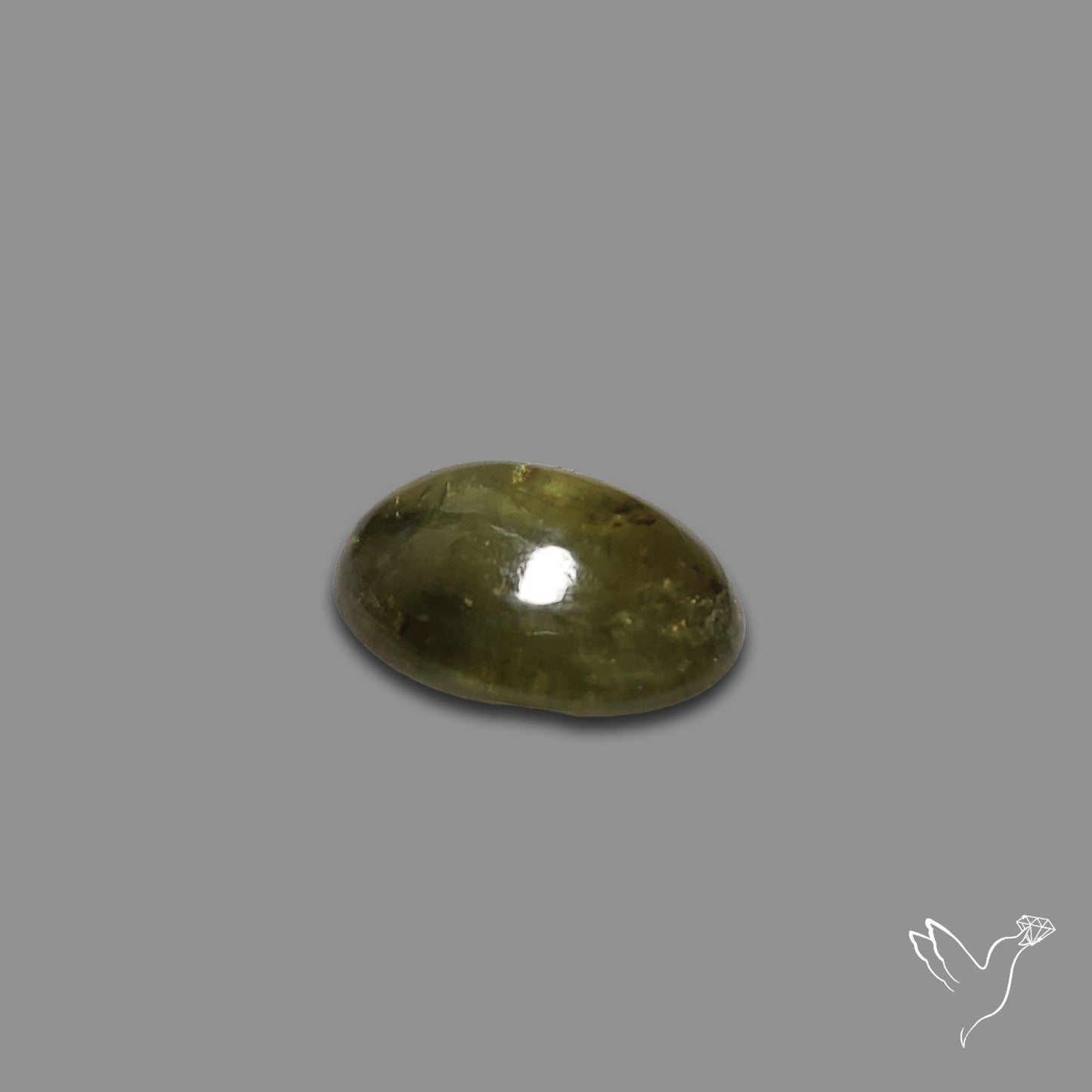 Rare Ural Demantoid Garnet Cabochon