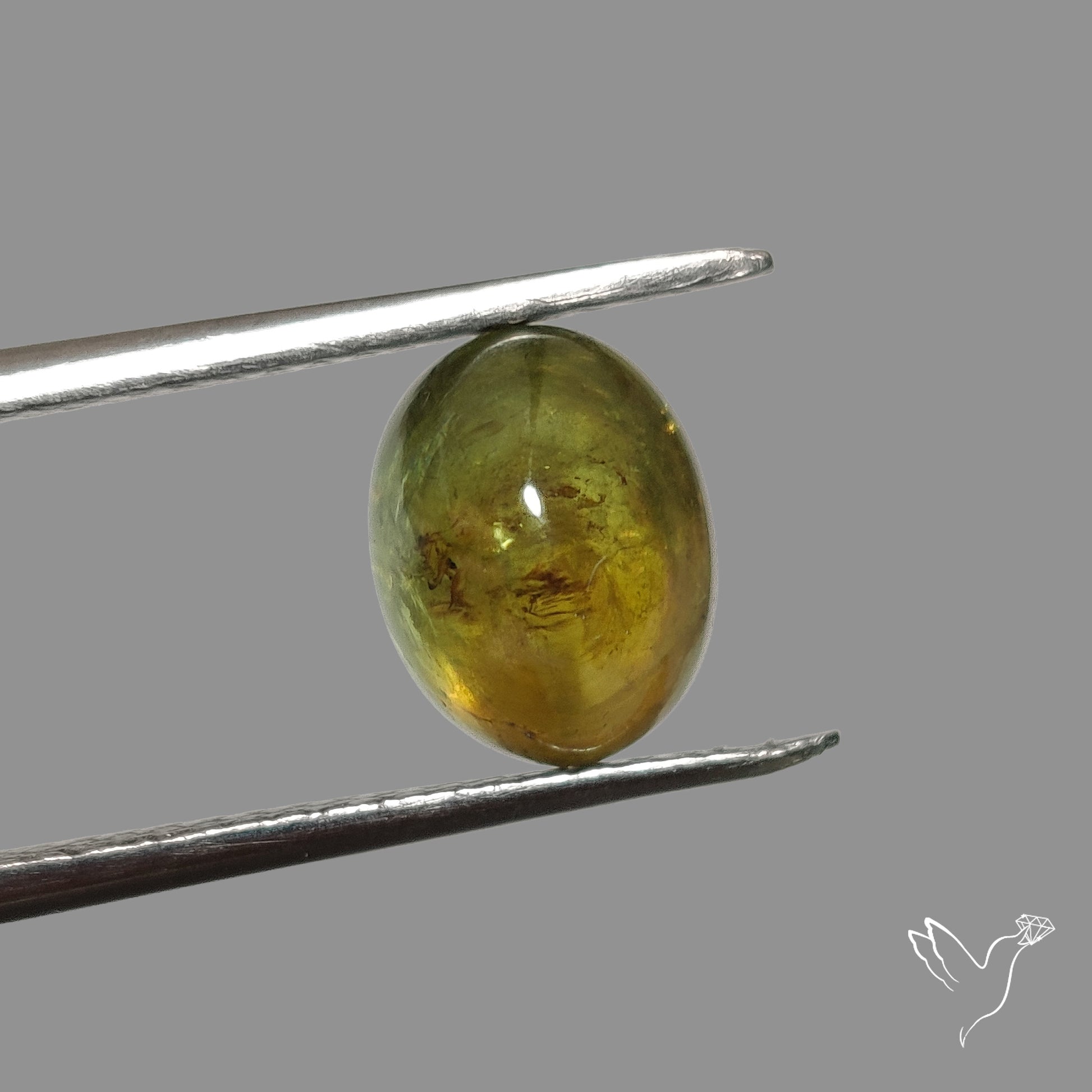 Rare Ural Demantoid Garnet Cabochon