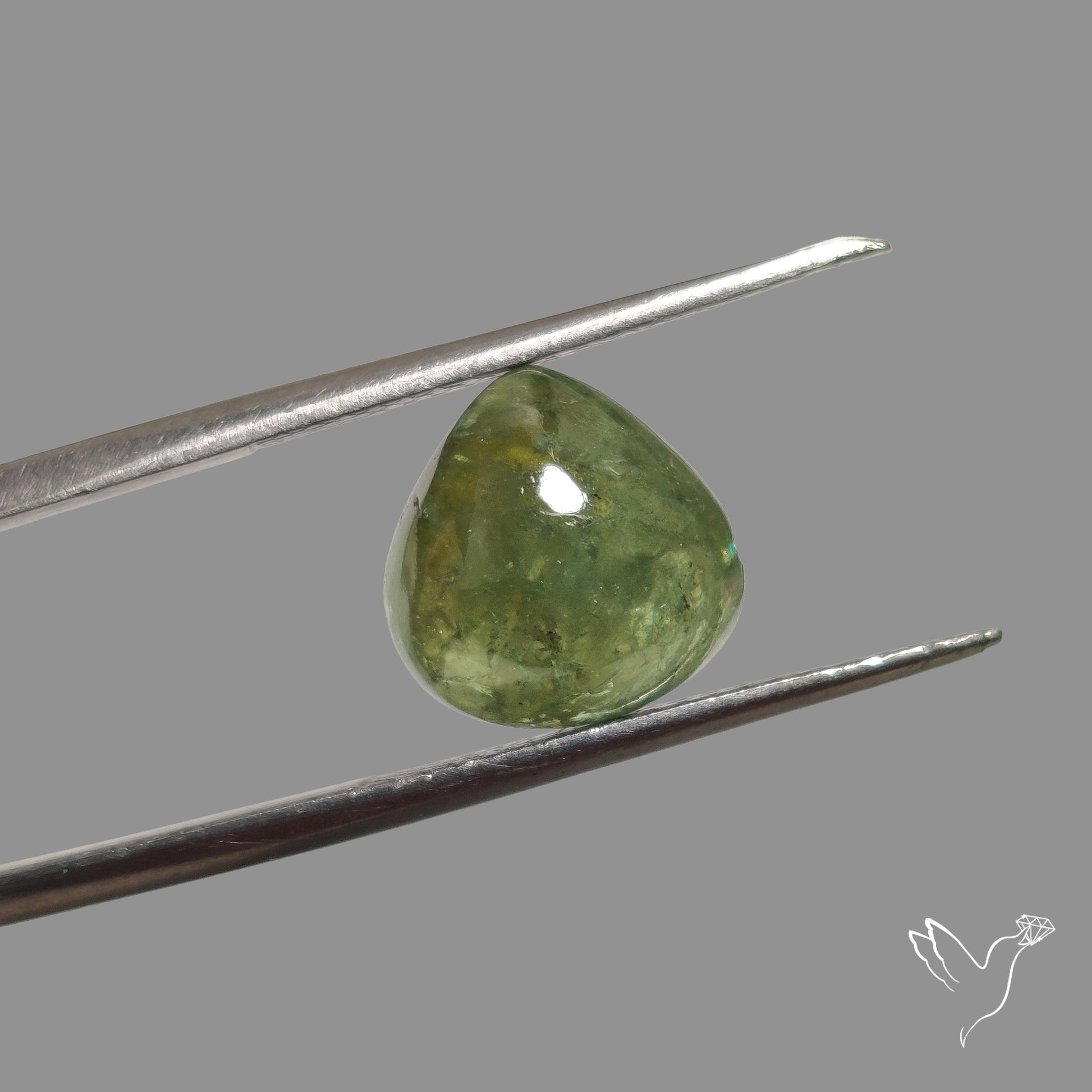 Rare Ural Demantoid Garnet Cabochon