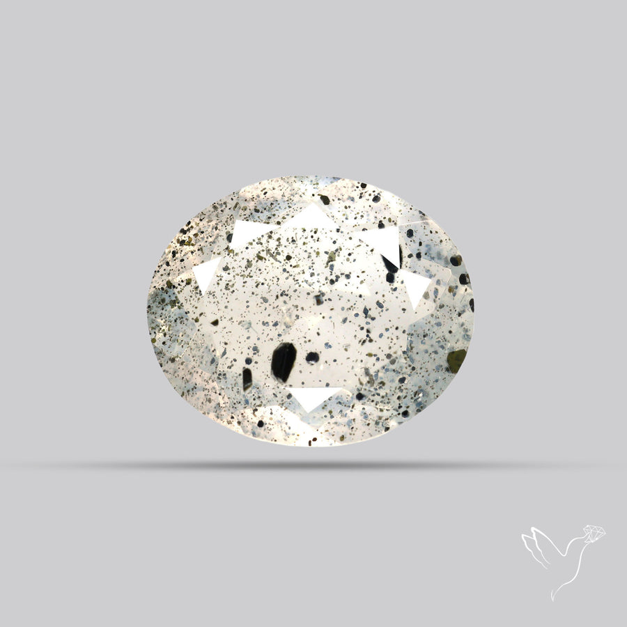Faceted Diopside In Quartz