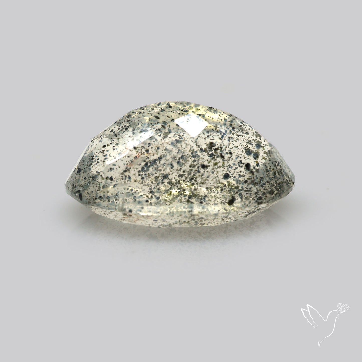 Faceted Diopside In Quartz