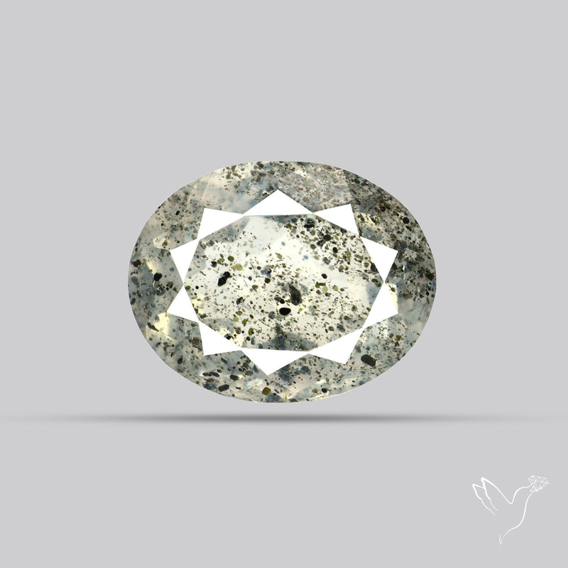 Faceted Diopside In Quartz